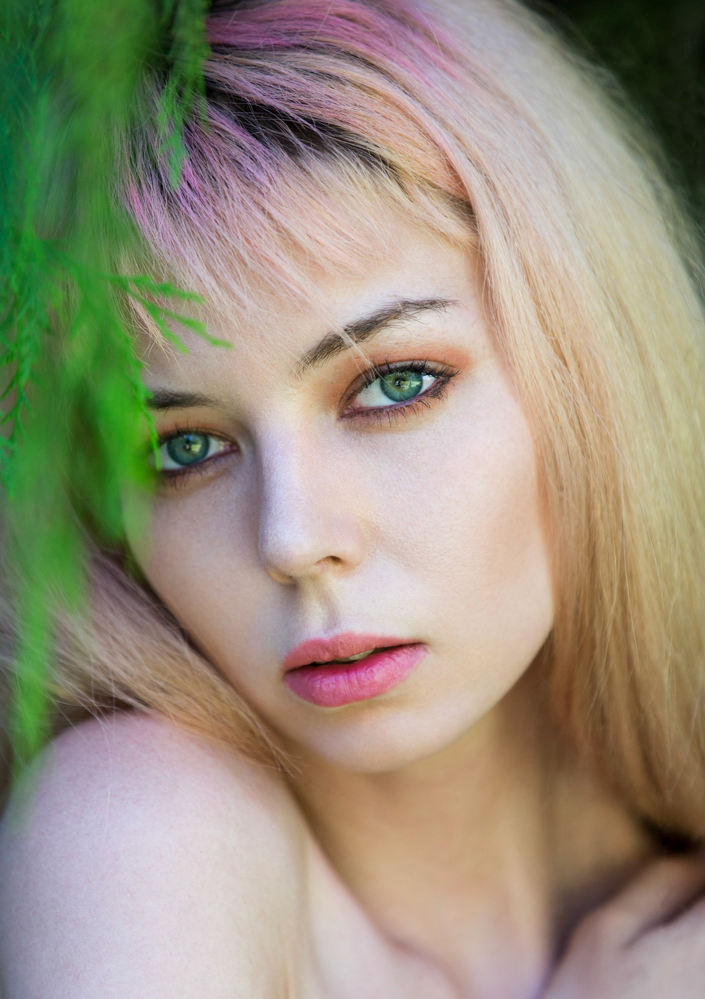 head shot, face outdoors under a tree using natural light