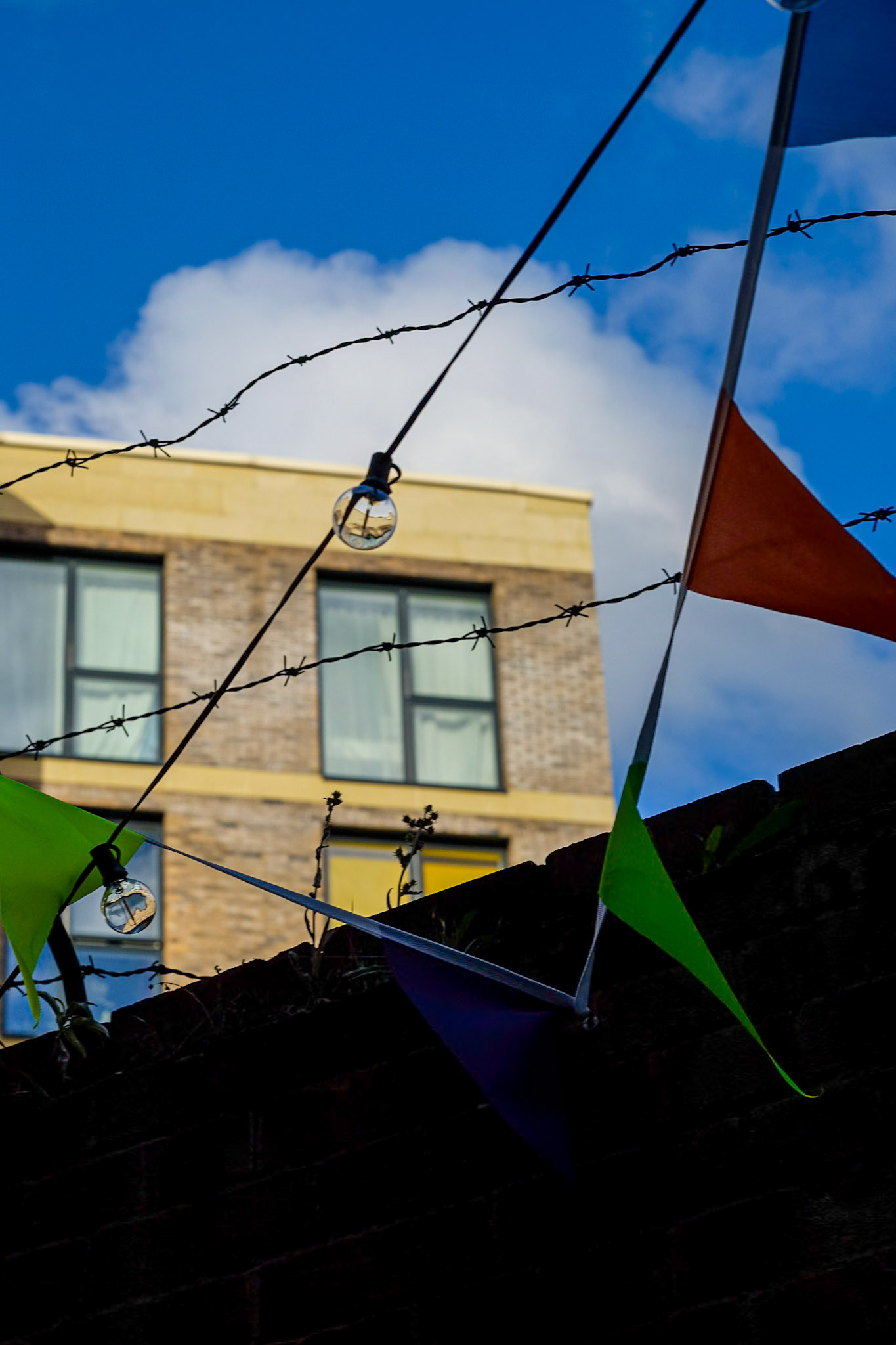 250/365 Bunting, blue skies and barbed wire