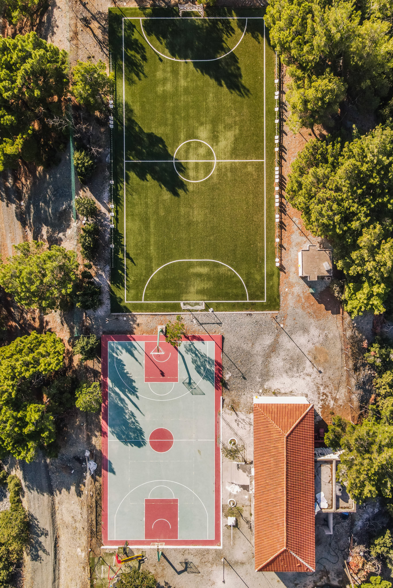 A topdown aerial photo of the two courts that are near the village of Ampeliko,Lesvos,Greece.  Taken with my DJI Mavic Air 2