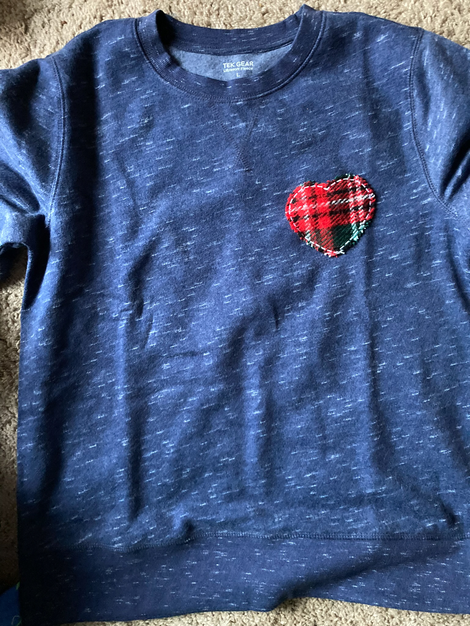 sweatshirt with a heart patch from a shirt