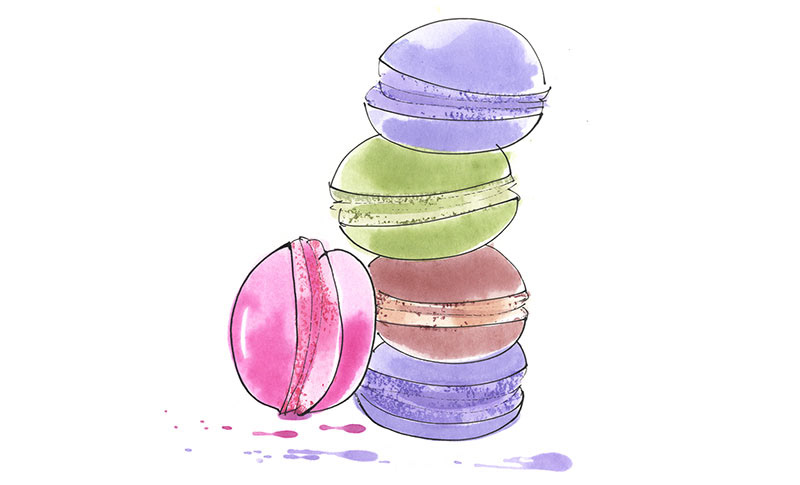 a tower of macarons of various flavours