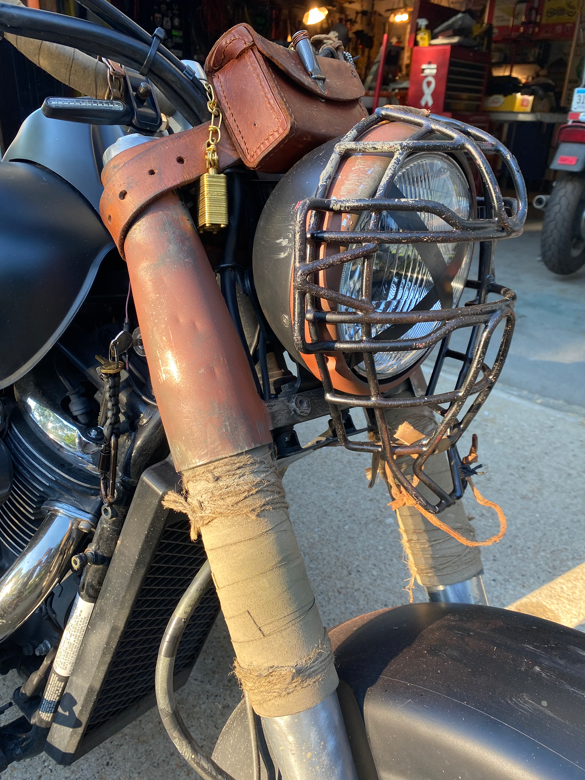 The catcher's mask flips up so I can get at the headlight housing.
