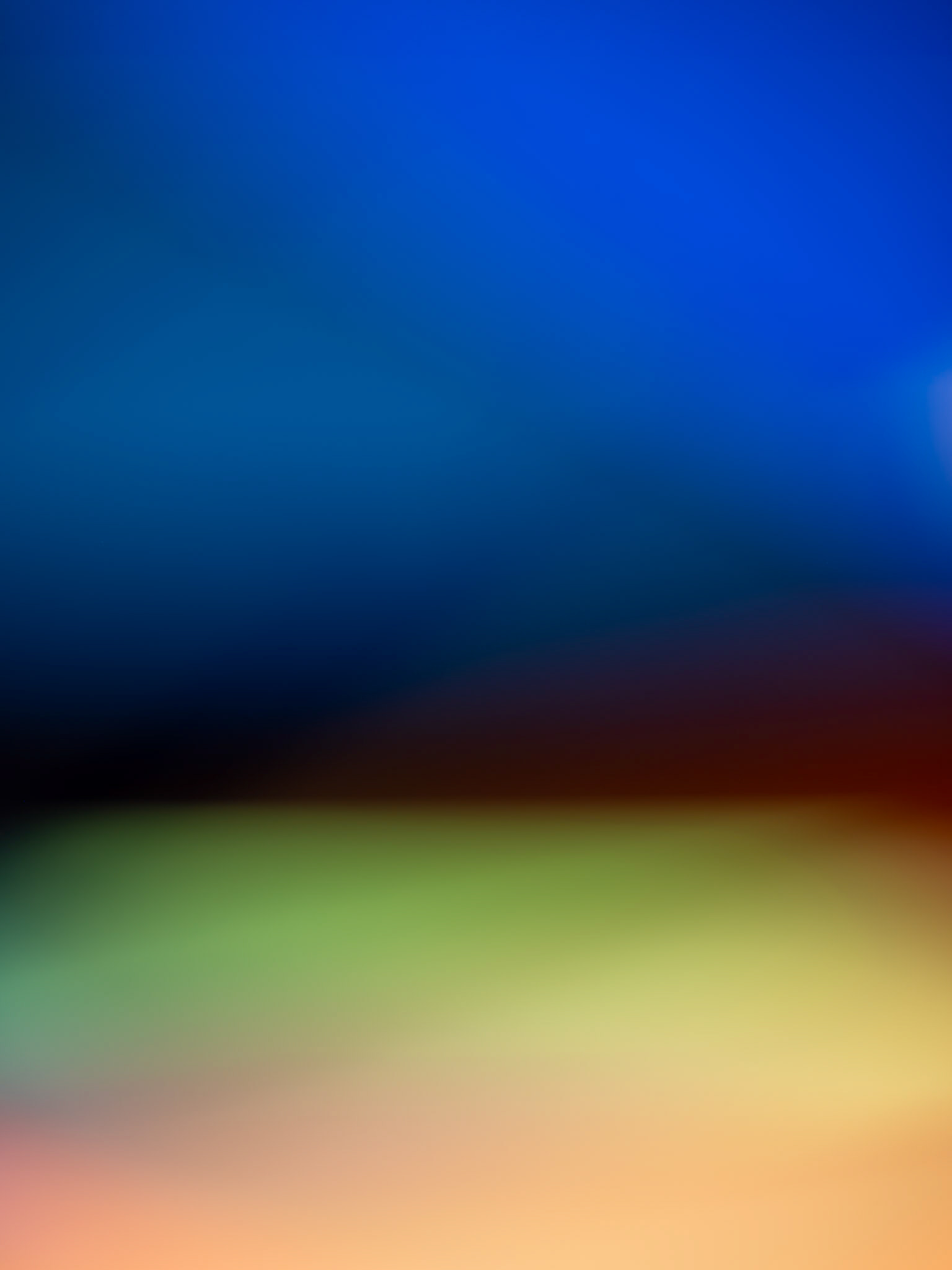 Escape VII — deep blue gradient above dark, green and peach bands.