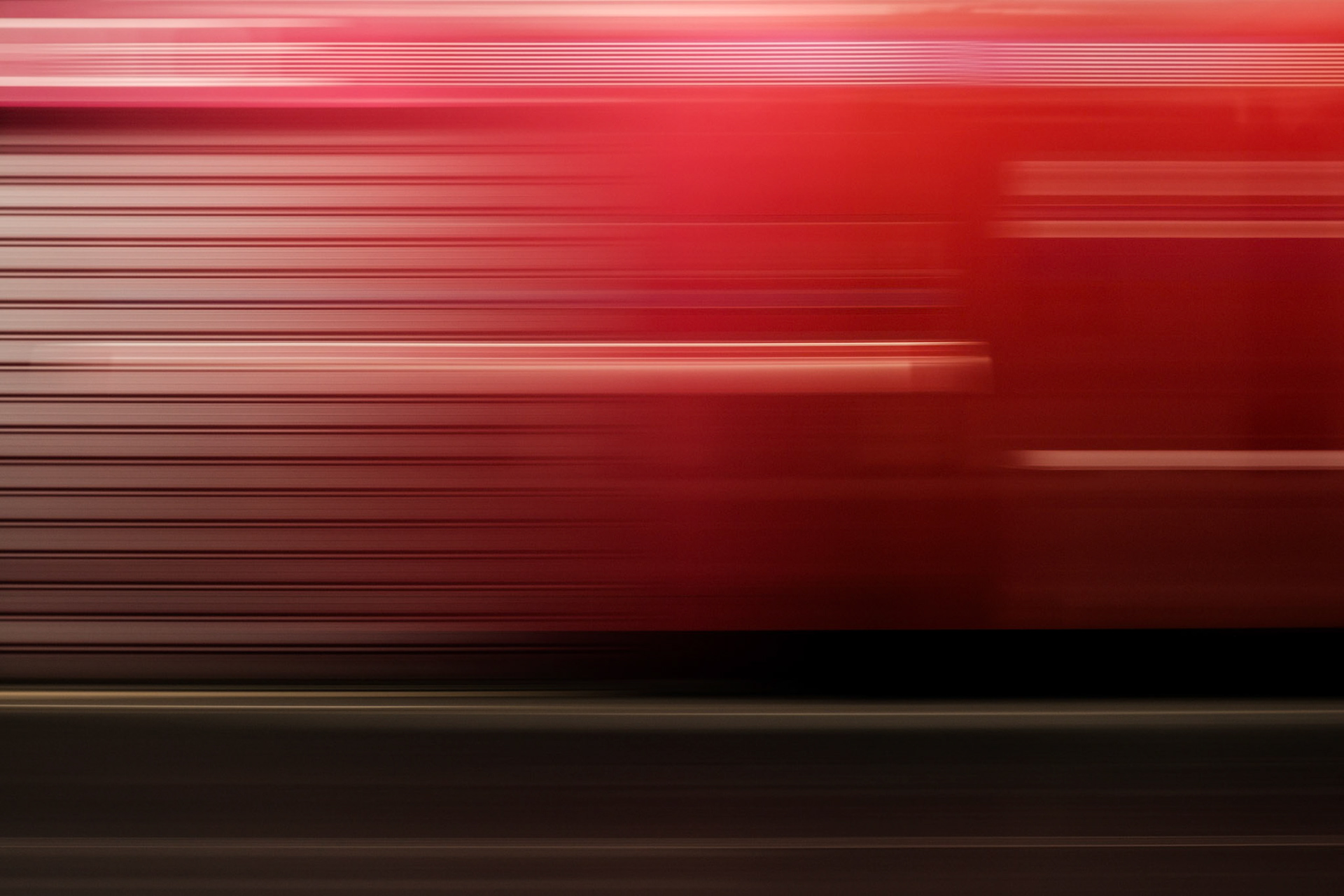 Digital Isolation I — red horizontal light streaks above a dark lower band.