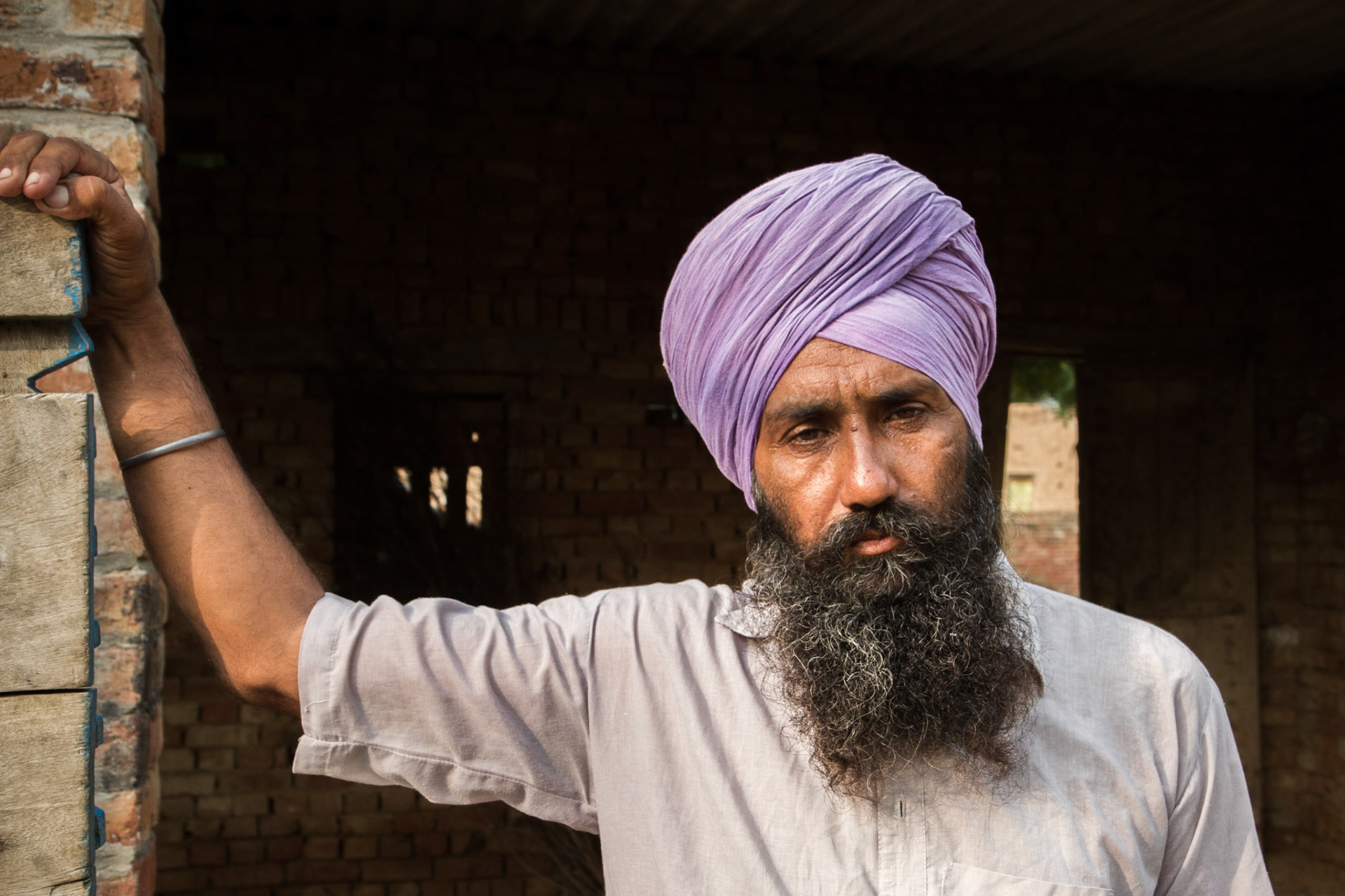 Mehma Sarja, Punjab, India. Baldev Signh, a farmer in Mehma Sarja, owns little land and says he cannot afford to take advantage of climate and weather services provided in the area. "Who will work my fields if I go to meetings? Also, the information is too technical and I am not fully literate." Taken September 2, 2012.