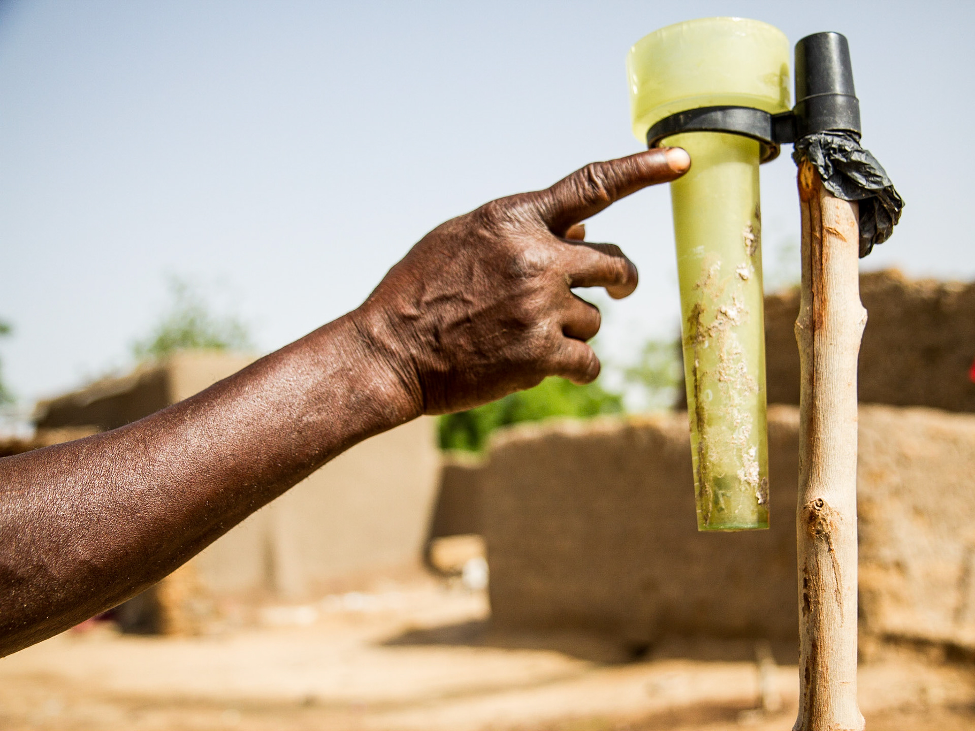 Djouna, Mali. Bouba Coulibaly, 59, is responsible for recording rainfall on Diouna's only rain gauge. He shares the data with other villagers, who use it to help make farming decisions. Taken July 1, 2012.