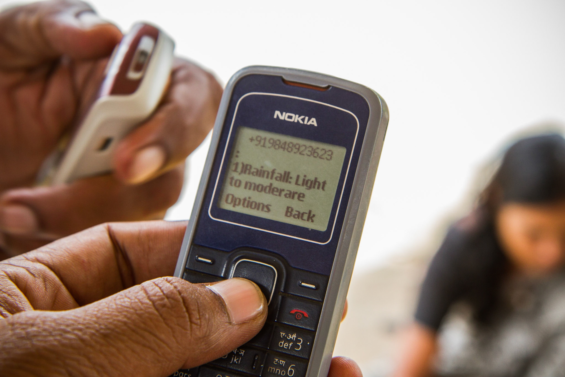 Andhra Pradesh, India. Cell phones are a common way to access agro-met information in many parts of India. Taken September 5, 2012.