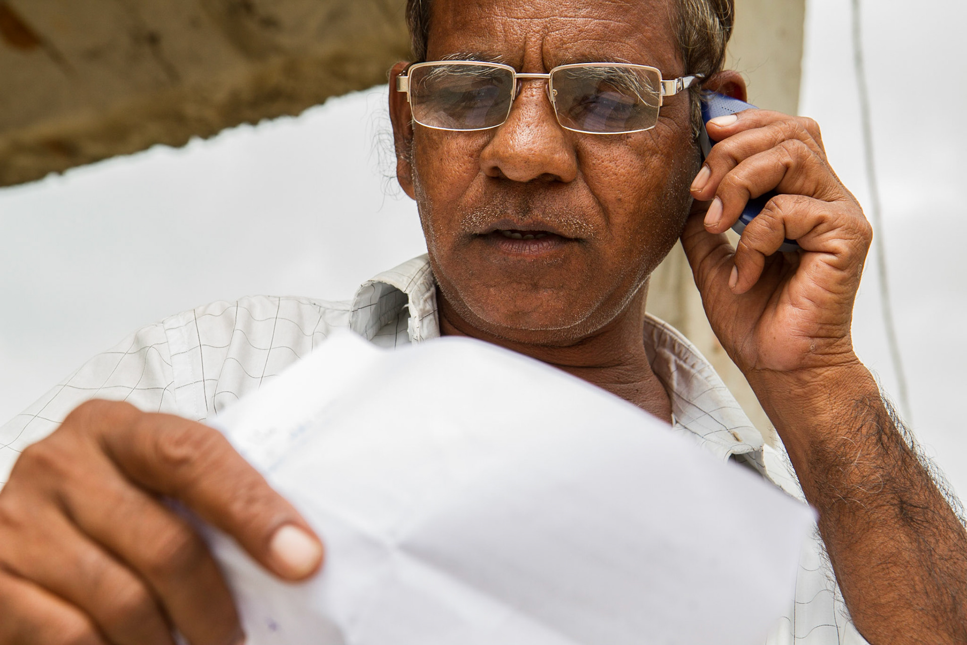 Andhra Pradesh, India. Krishna Reddy, 58,  says agrometeorological bulletins produced by the local agricultural university are very useful for making decisions. Taken September 5, 2012.