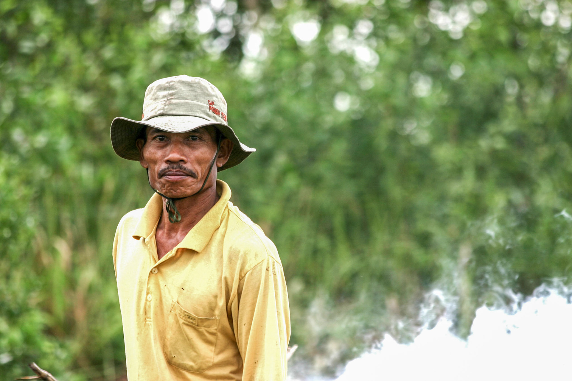 A farmer in Central Kalimantan, Indonesia burns his land to clear for planting rice and other crops. Taken August 31, 2008.