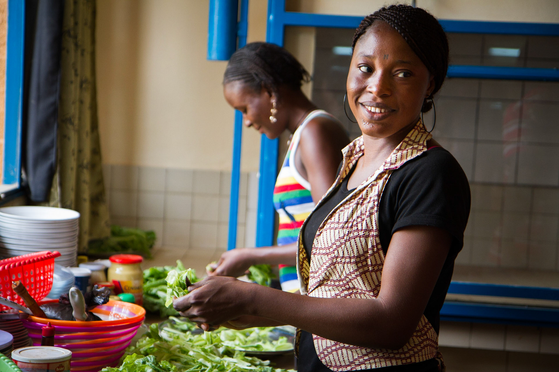 Niamey, Niger. Two women prepare lunch for staff at the Centre Regional de Formation et d'Application en Agrométéorologie et Hydrologie Opérationnelle. Taken May 8, 2012.