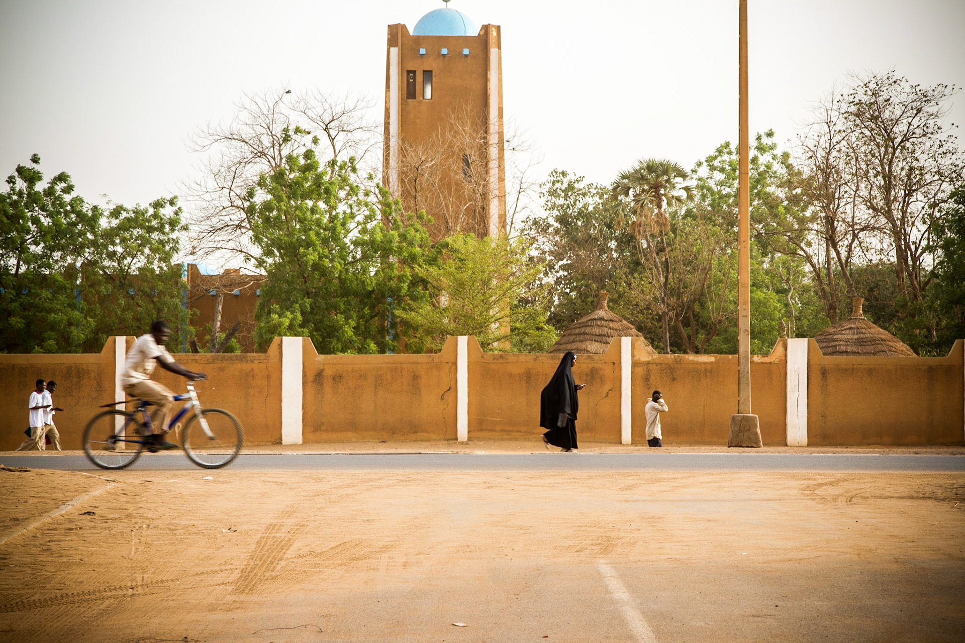 Niamey, Niger. Pedestrians and bicyclist. Taken May 9, 2012.