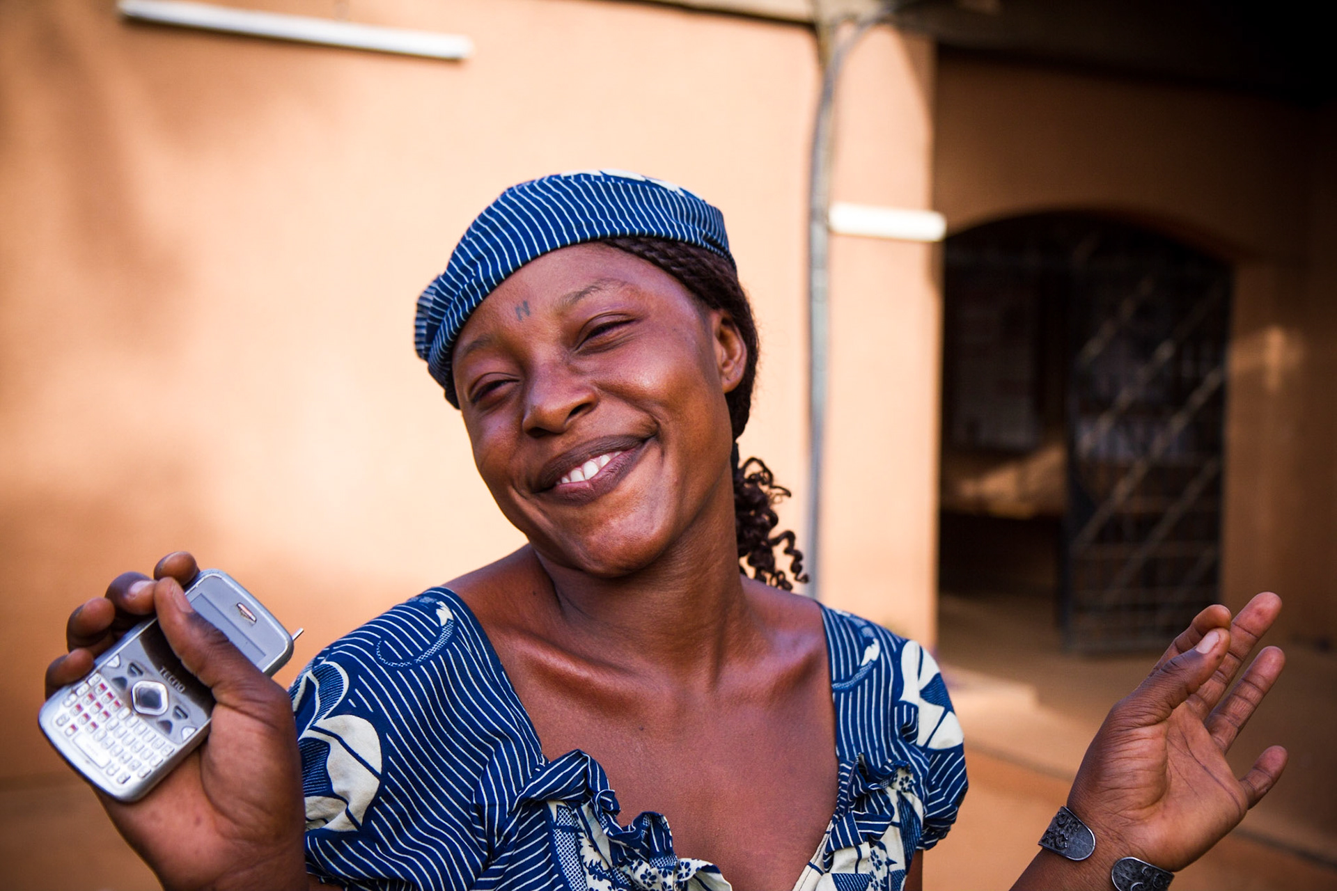 Niamey, Niger. A young woman smiles for the camera. Taken May 10, 2012.