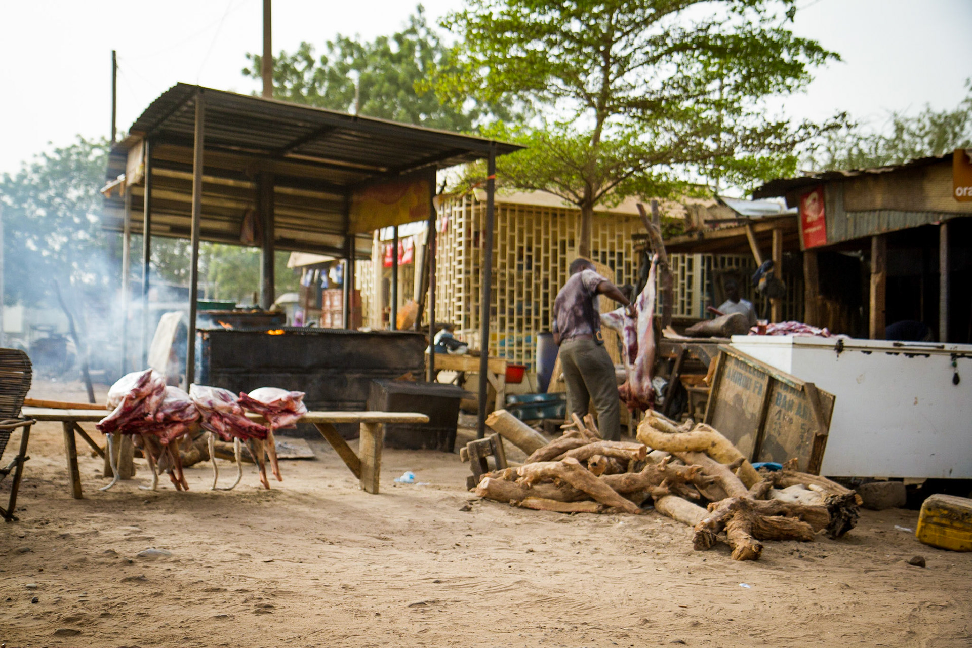 Niamey, Niger. A meat seller prepares his goat carcasses in the early morning. Taken May 9, 2012.