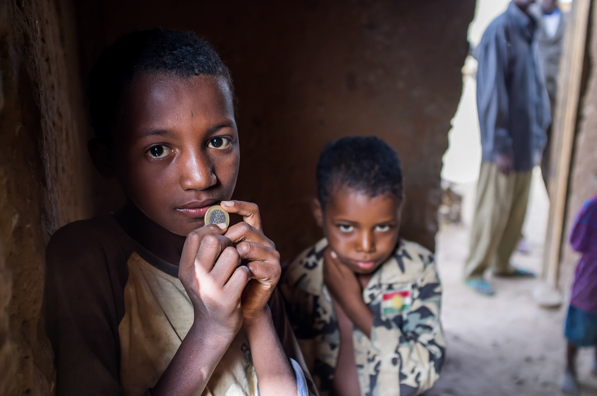 Niamey, Niger. Two boys from the farming village of Soudoure, on the outskirts of Niamey, Niger. Taken May 11, 2012.