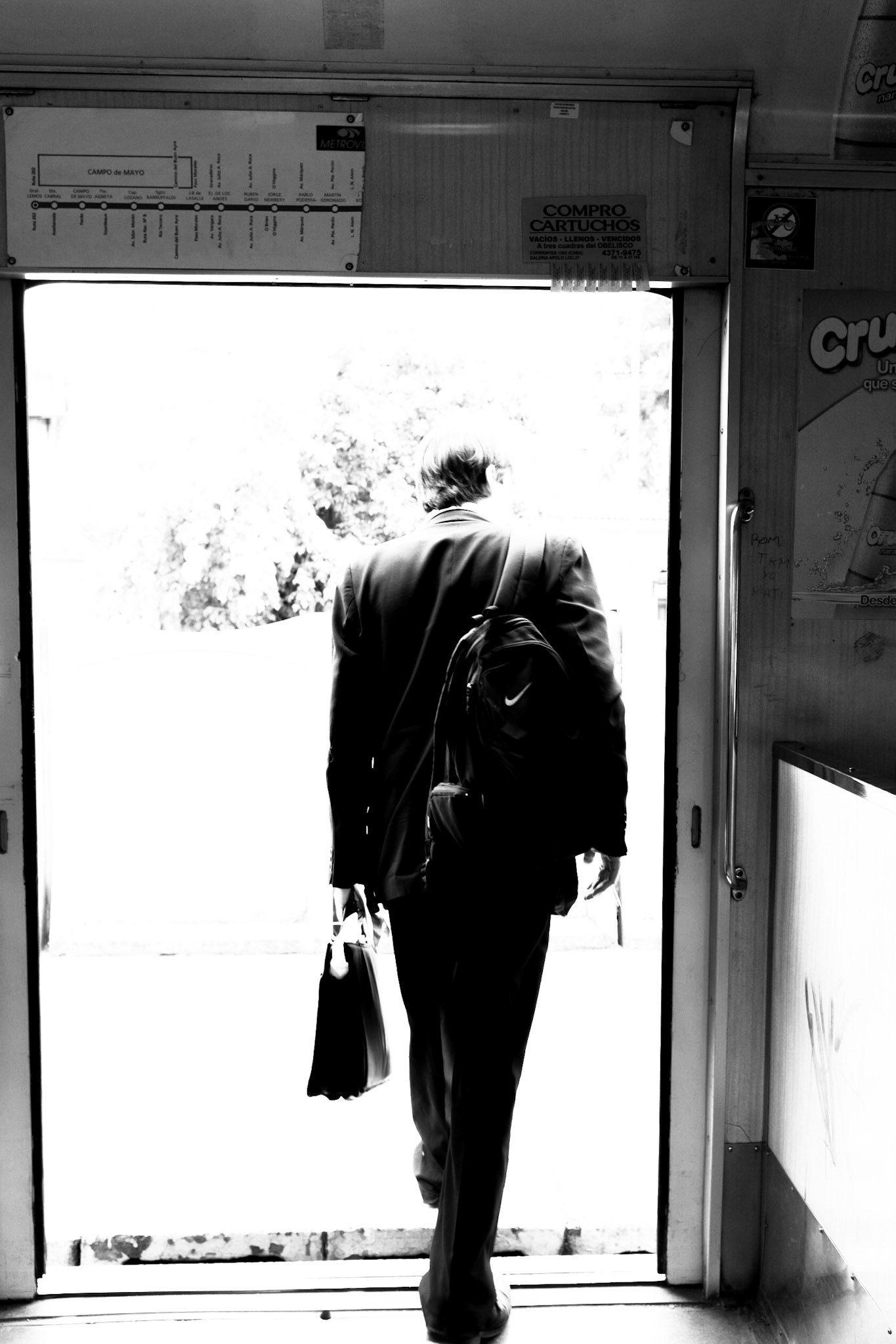 A man exits a metro train in Buenos Aires.