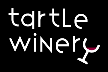 A modern winery logo for a more youthful crowd, was achieved by using a monochromatic color scheme, creating a wine glass with a “Y” and tilting it as though it is being sipped.