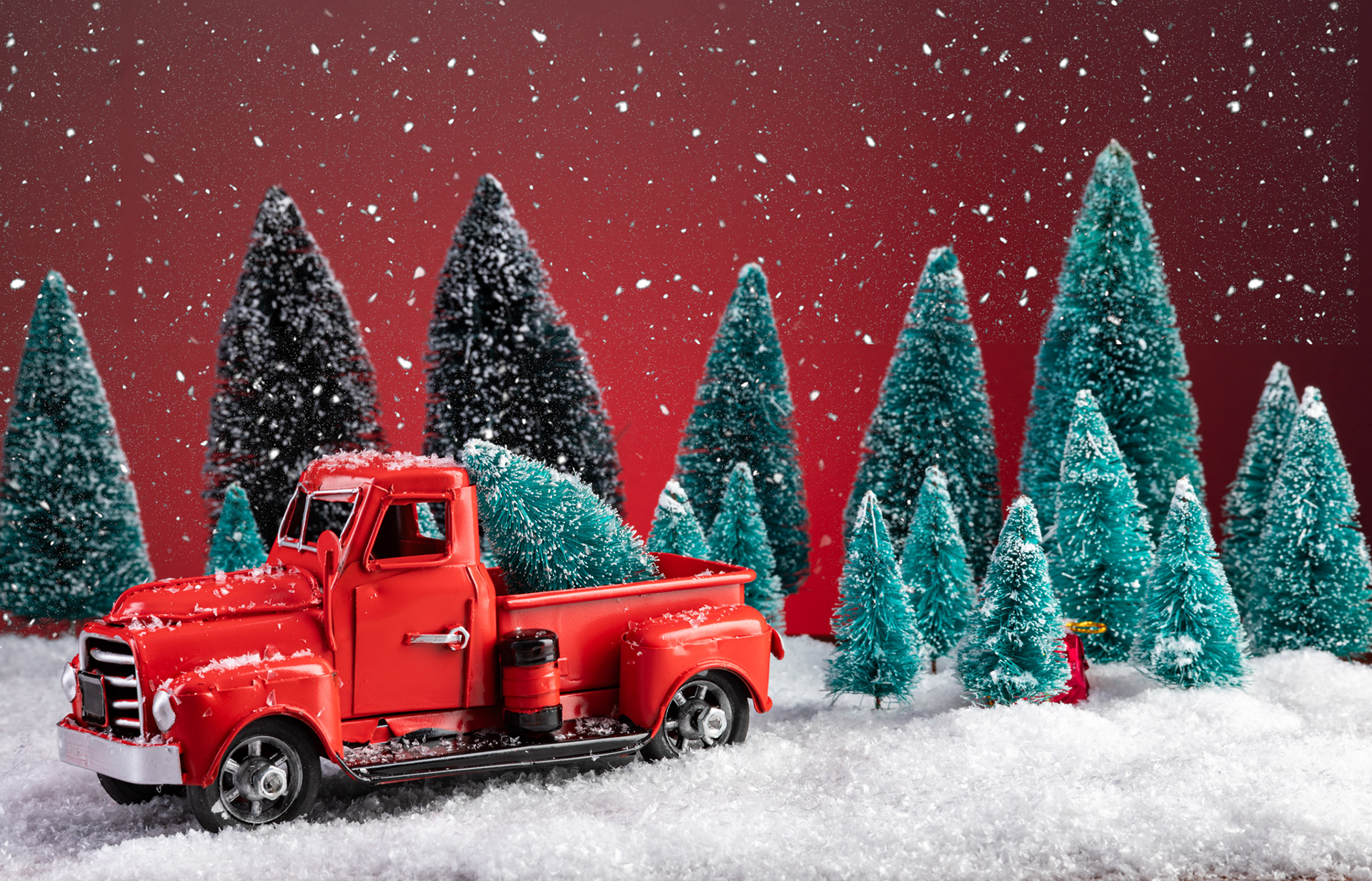 A christmas still life with a red truck