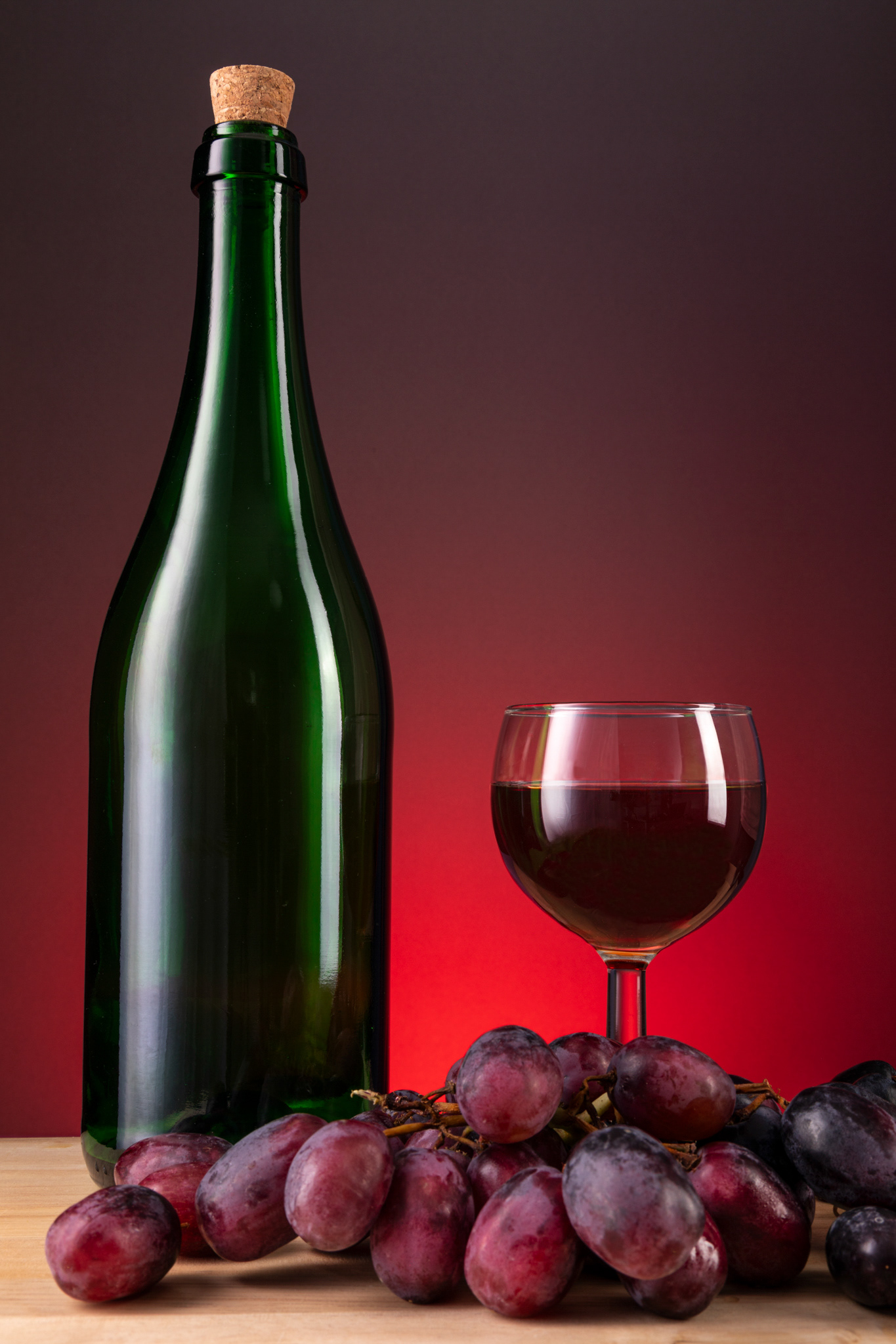 red wine still life and grapes