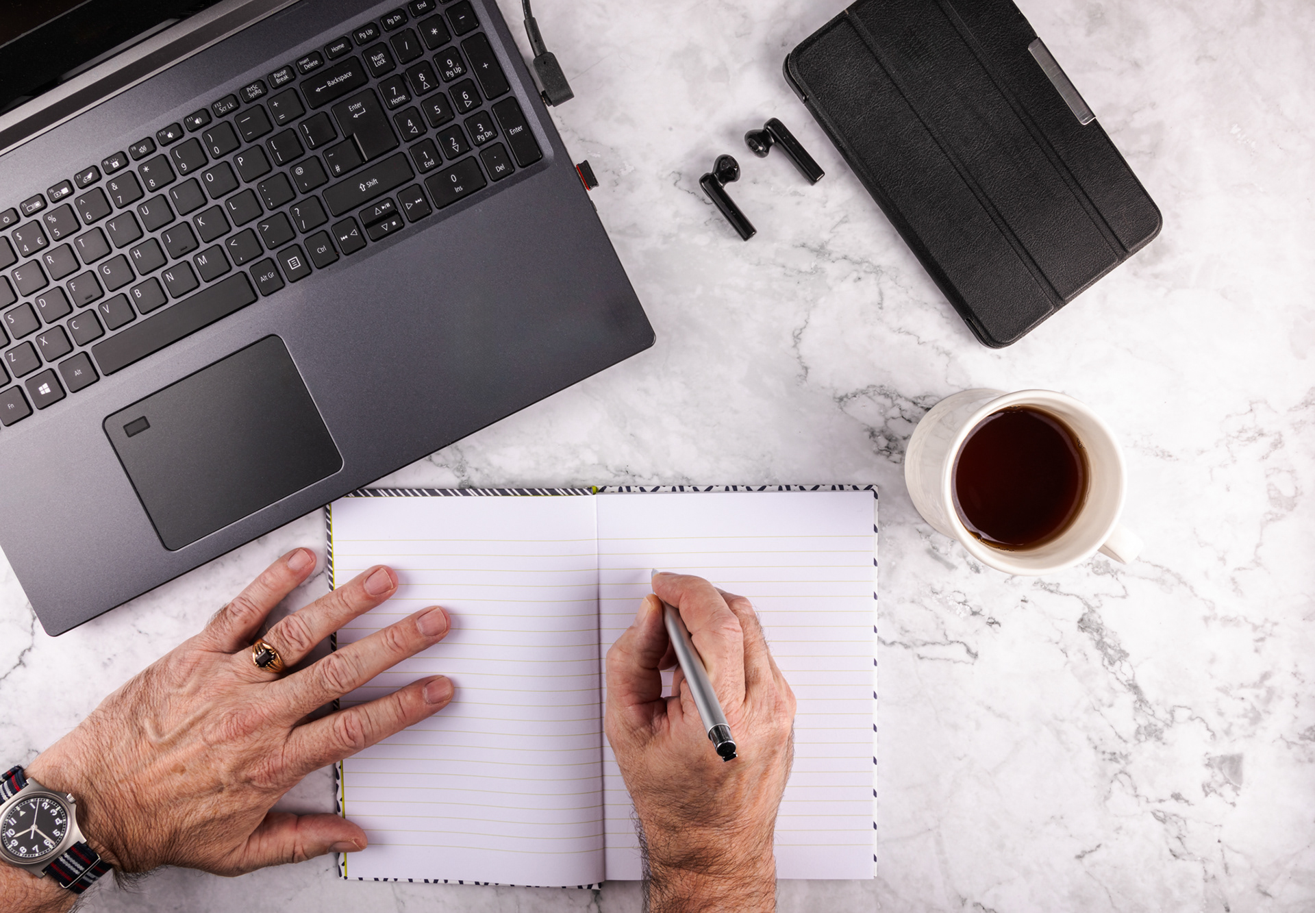 writting in a notebook