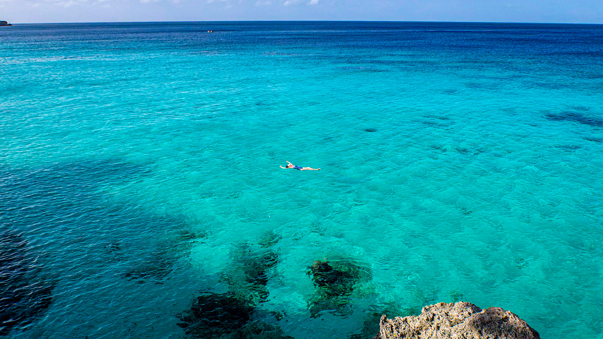 Floating in the blue waters of Westpunt, Curacao