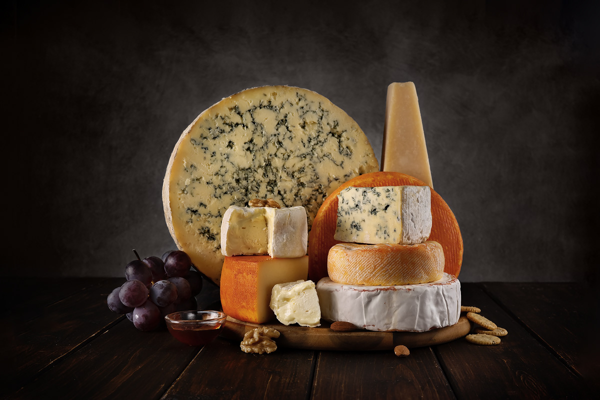 Fine cheese still life – elegant lighting and atmosphere for gourmet products