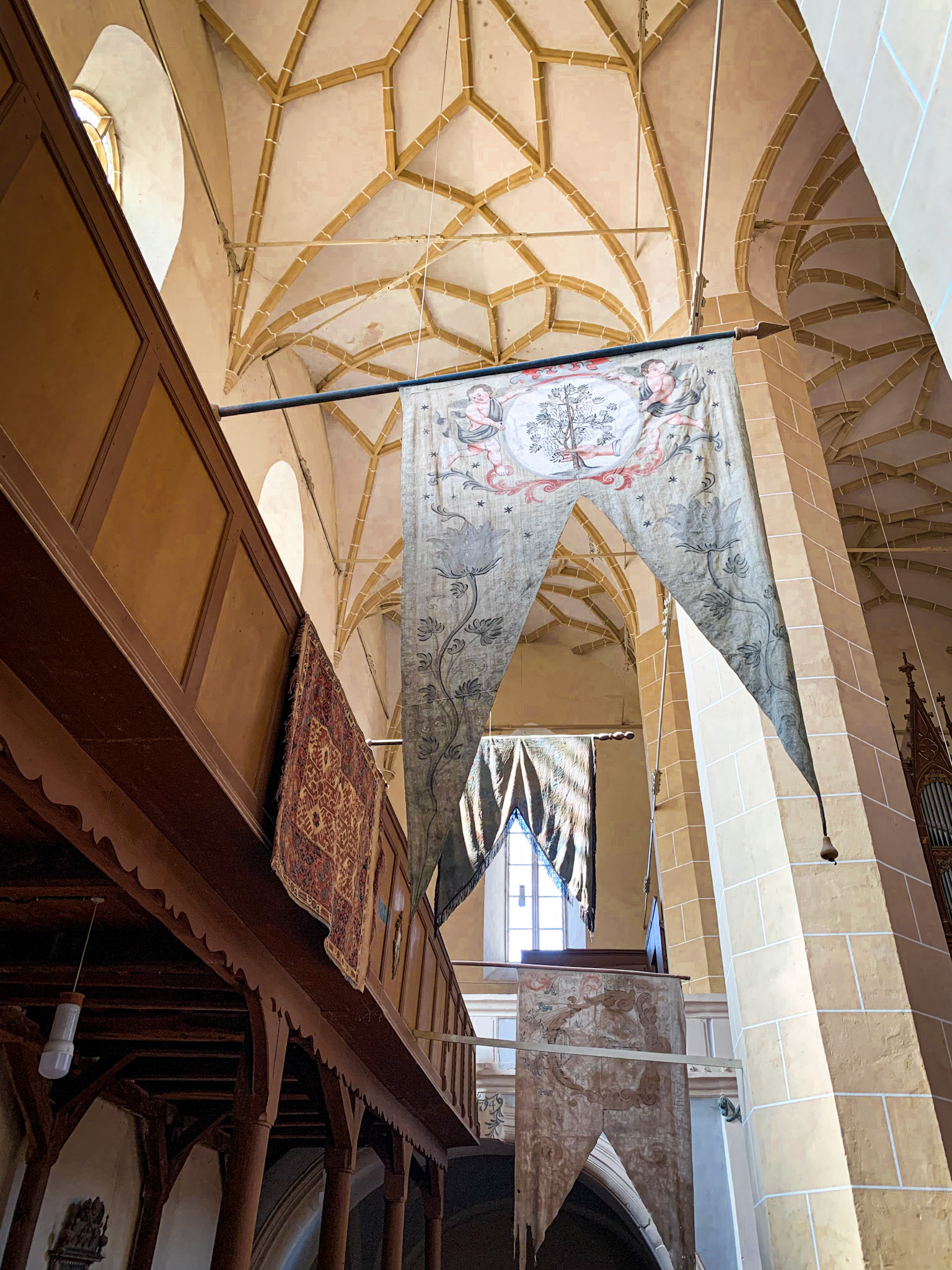 The flags indicate the which guilds the church would seat