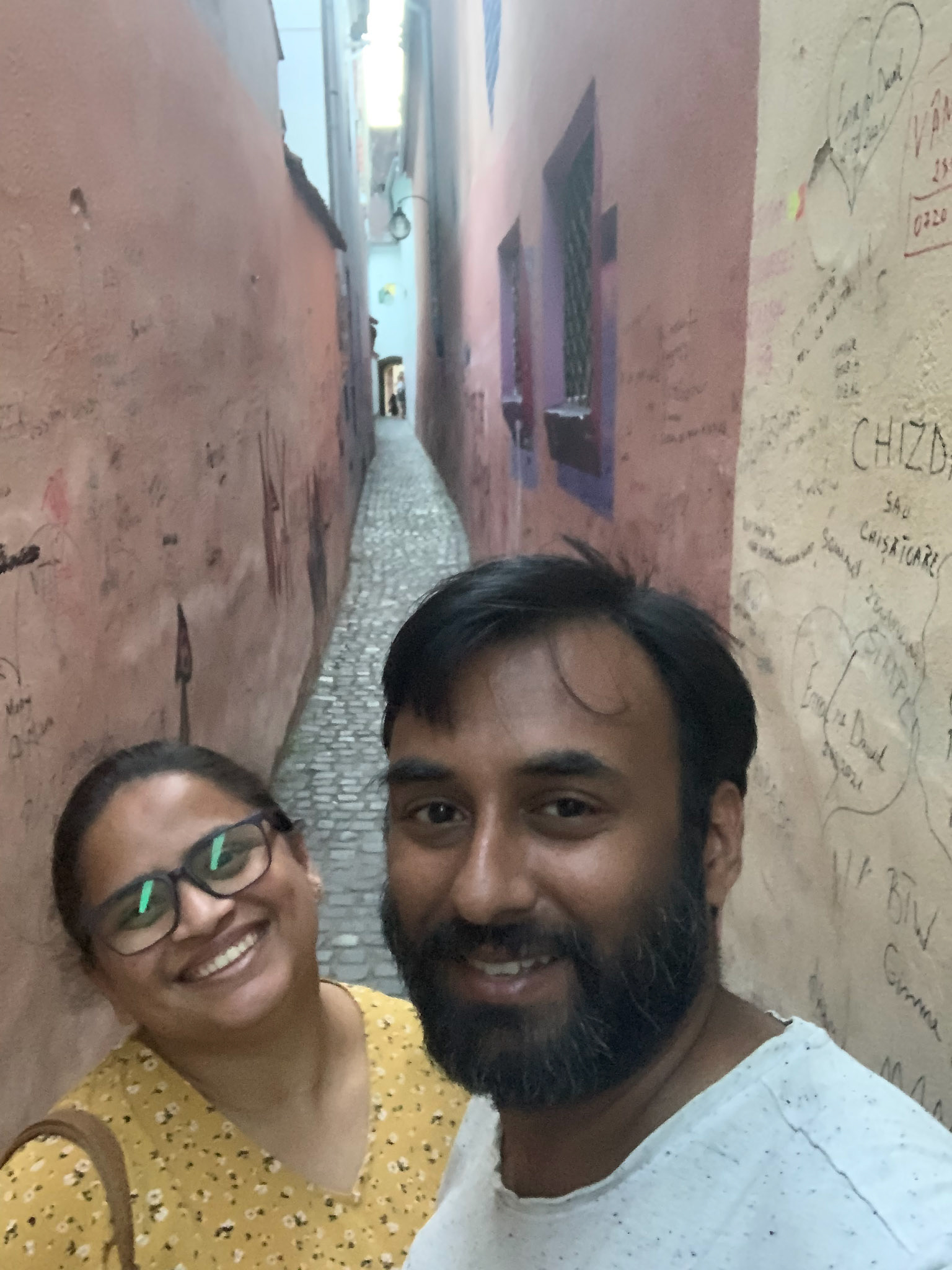 Strada Sforii, one of the narrowest streets. Sadly heavily defaced by idiots