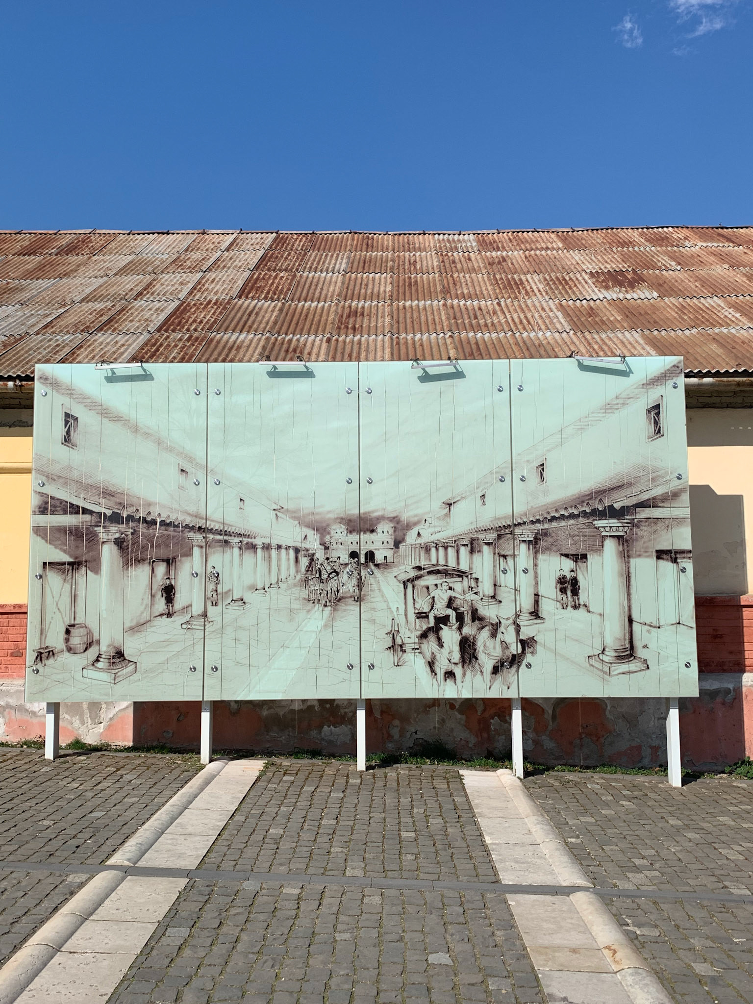 A picture indicating how the road and the columns looked in Roman times