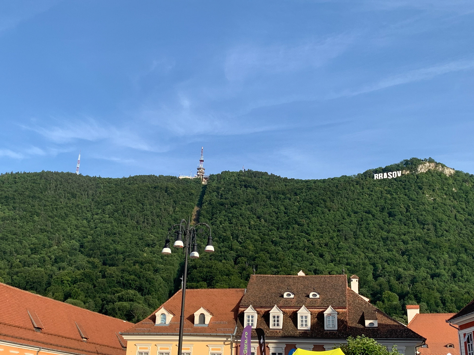 View of the Brasov sign at Tampa peak from Piața Sfatului, i.e., Brasov Main Square