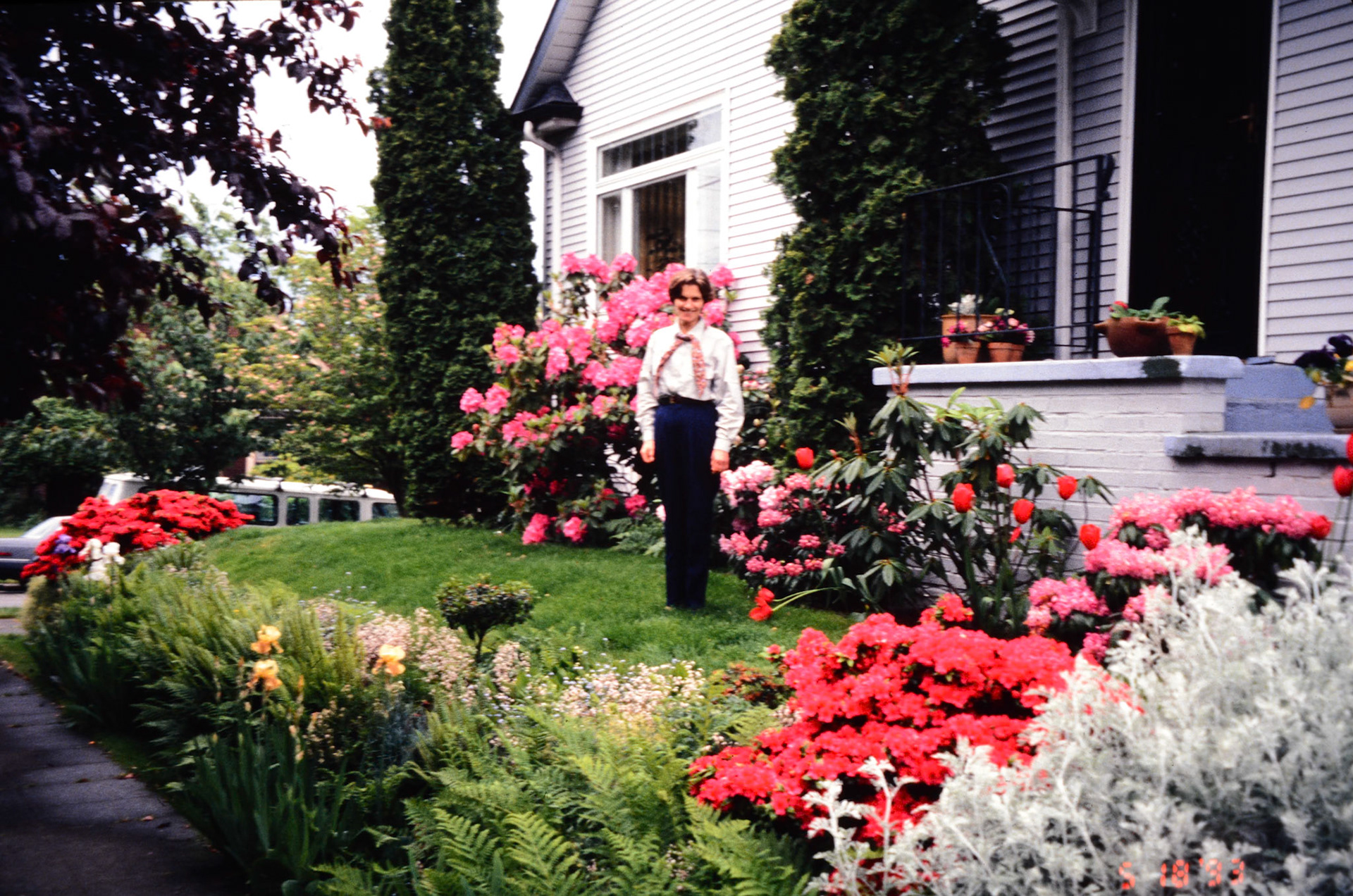 With her vibrant rhododendrons and azaleas in full bloom in the Ballard backyard.