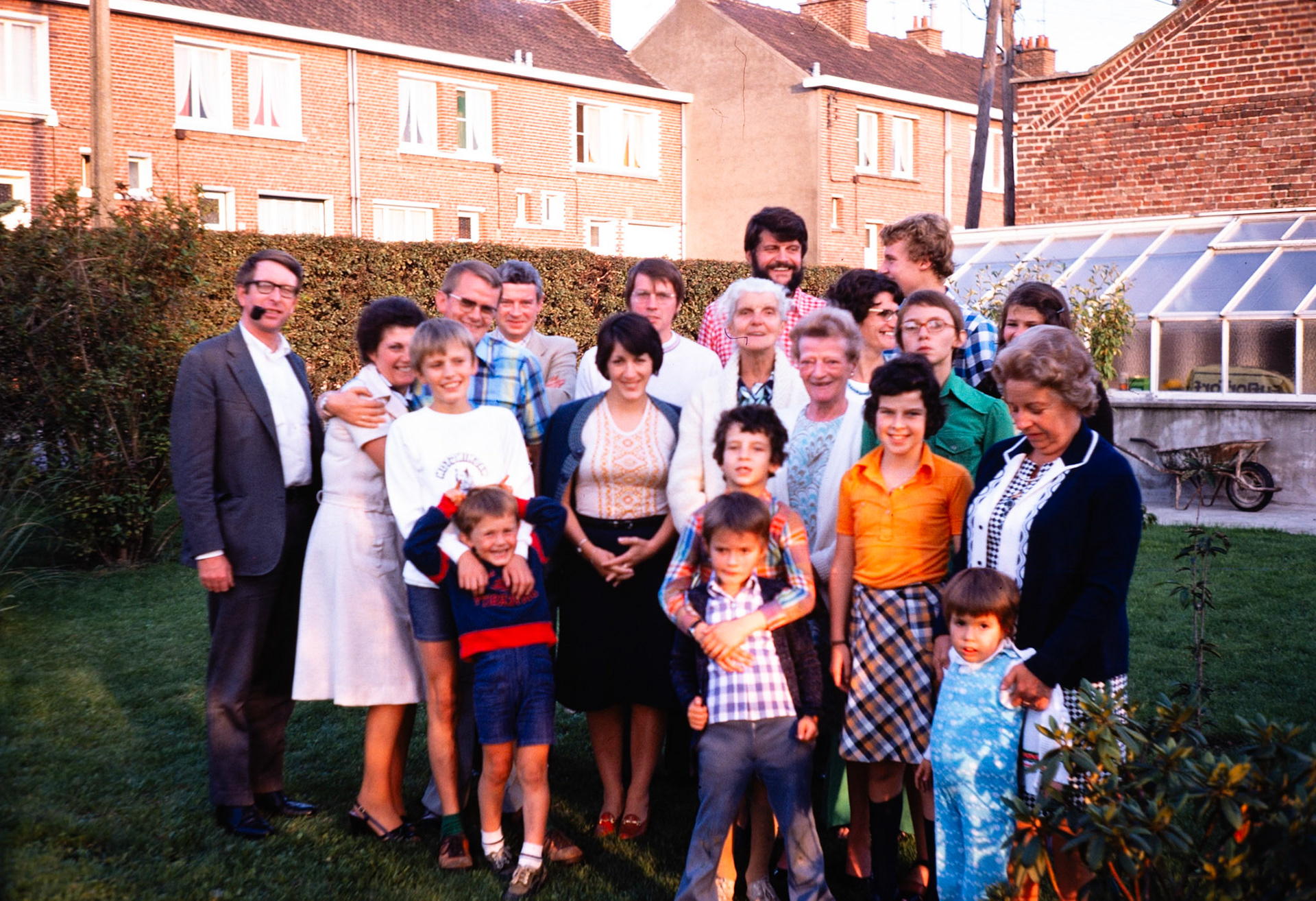 A smiling family photo with relatives in France.