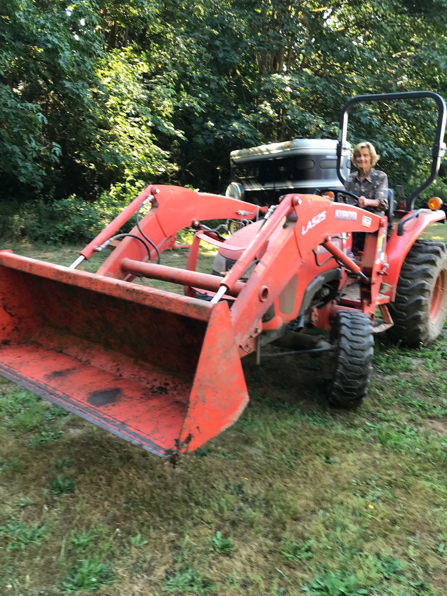 Agnes at work—tractor and all!