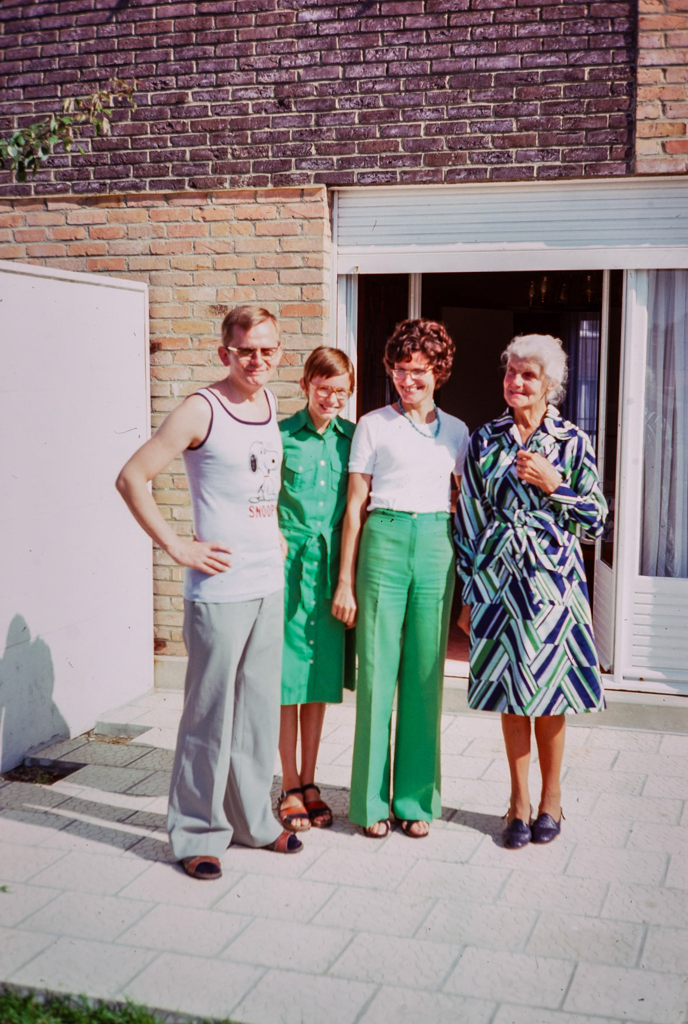 With her mother and family in France.