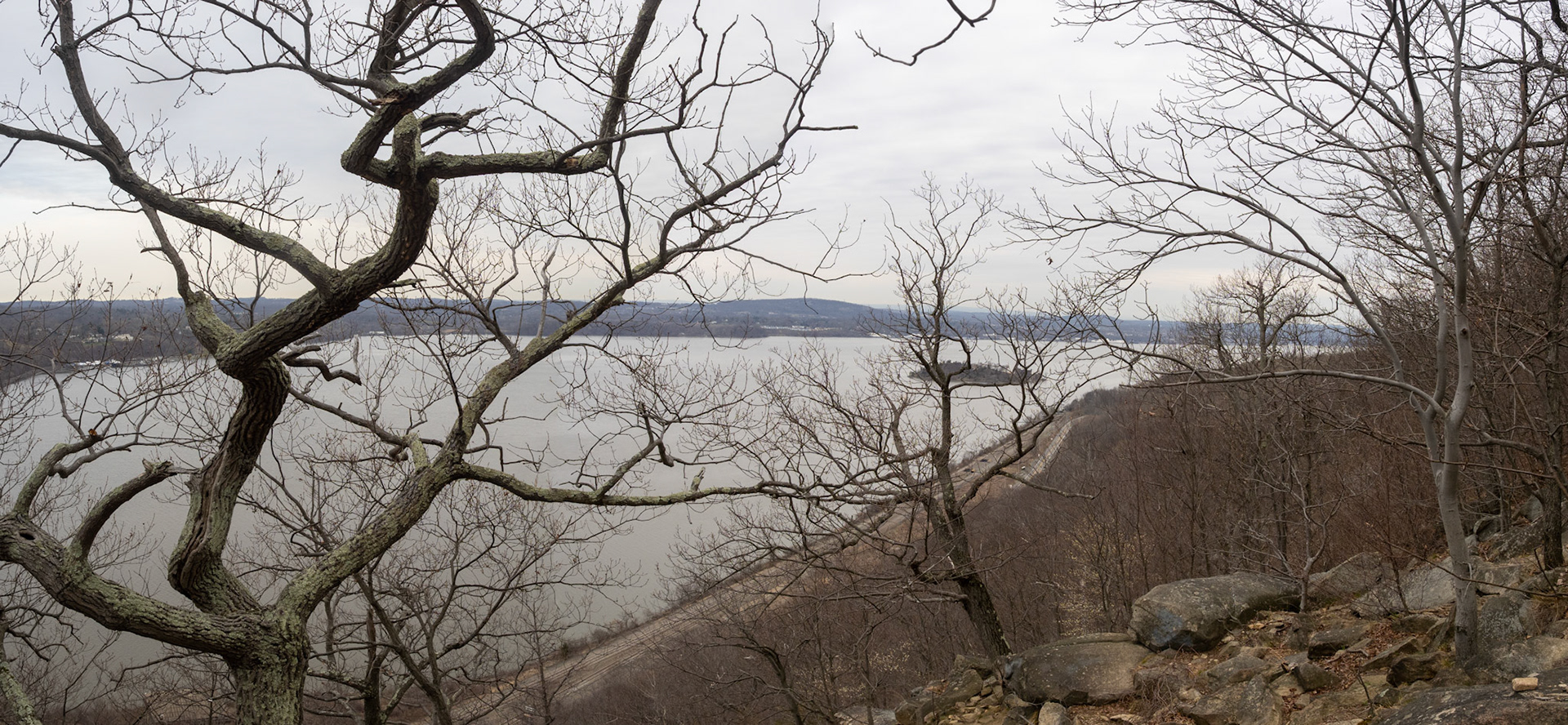 Through the trees looking up-river with Bannerman's Island and Castle (google it)