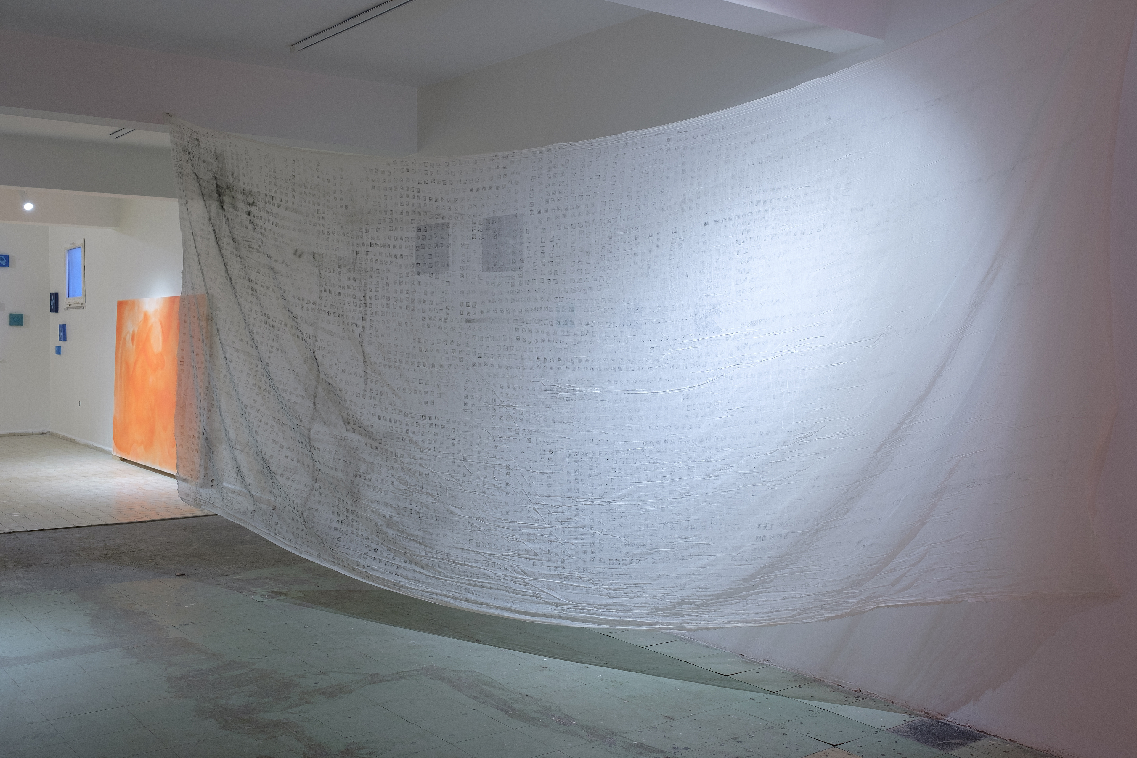 A'E'N', 2022, installation, ink stamp on fabric, 300 cm / installation view from Occupation, Barın Han, 2022