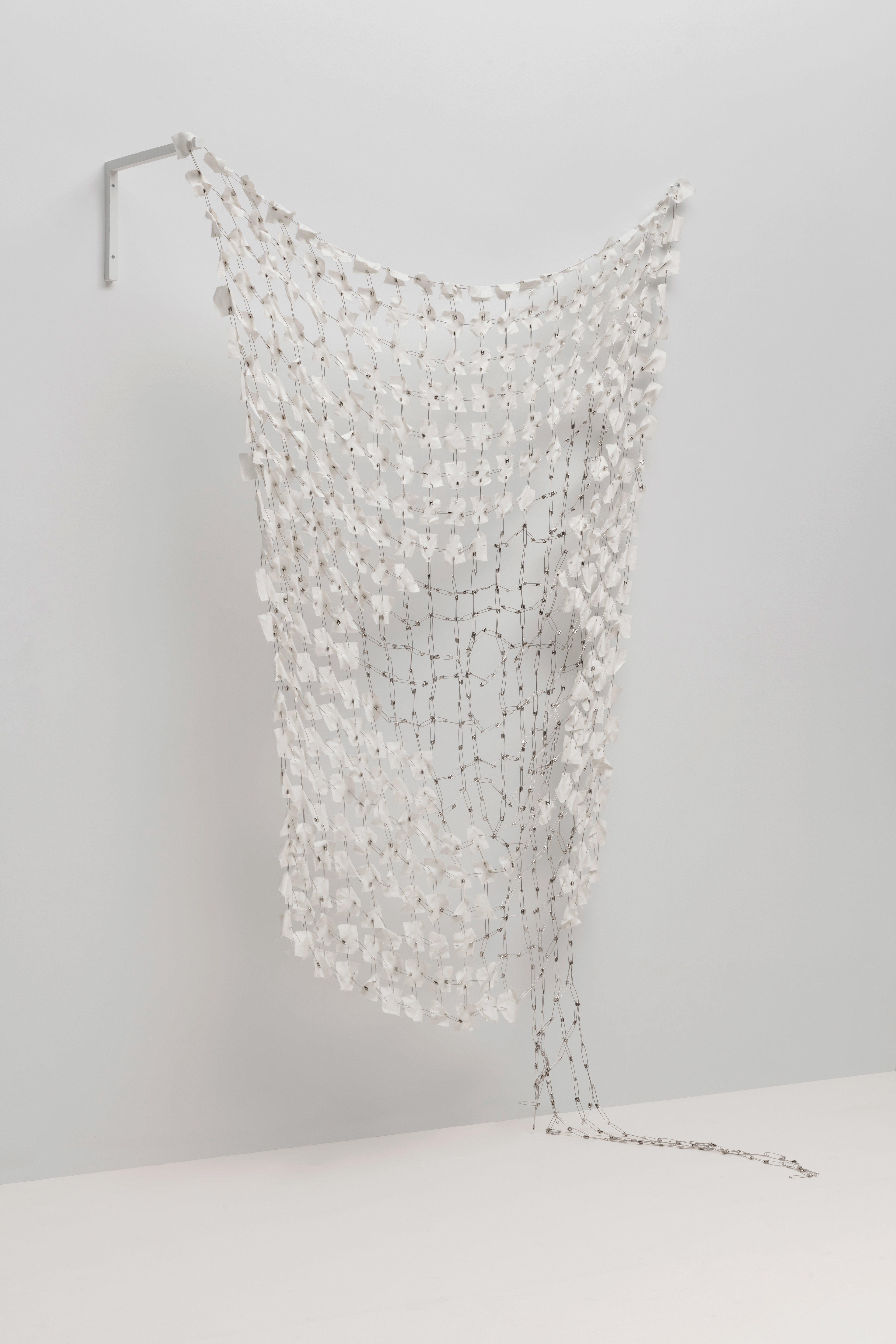 Puzzle, 2022, installation, fabric, safety pins, 250 x 300 cm / installation view from 8th Color: Woman and Trace, AKM, 2023