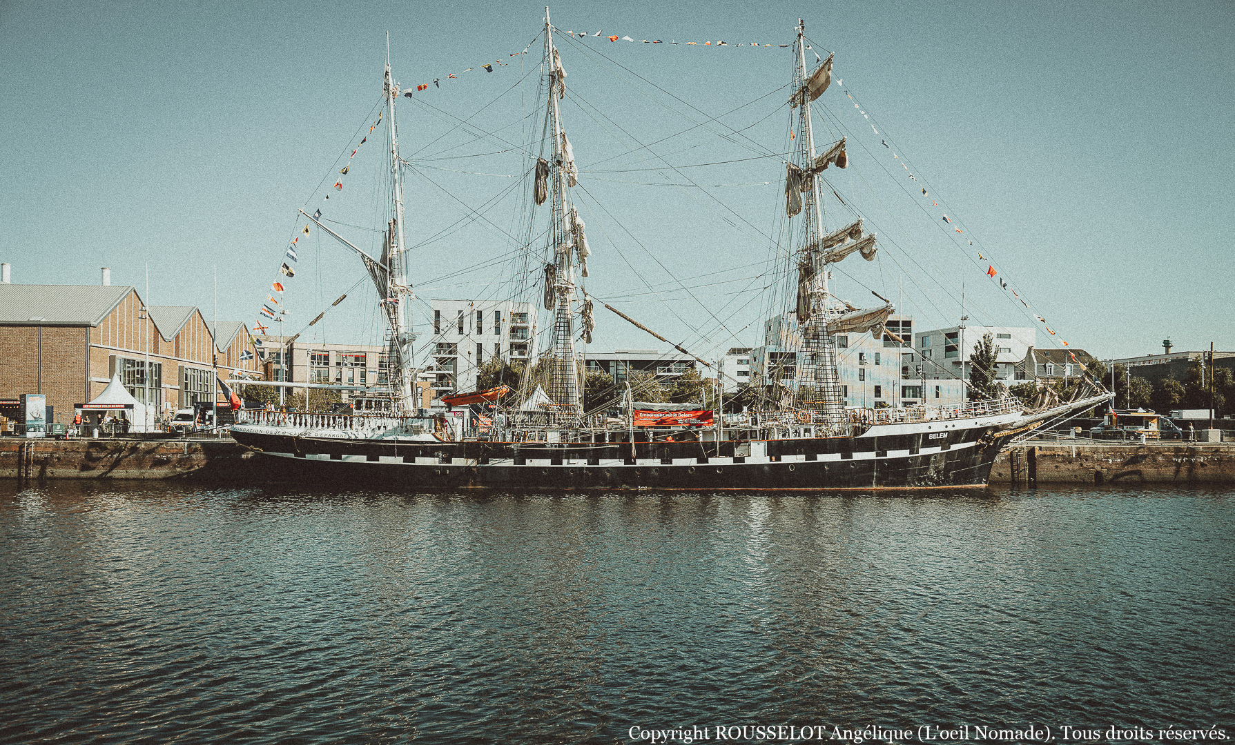 Patrimoine maritime d'exception au Havre : photographie de grand voilier à quai, témoigner de la majesté des géants des mers lors des Grandes Voiles.