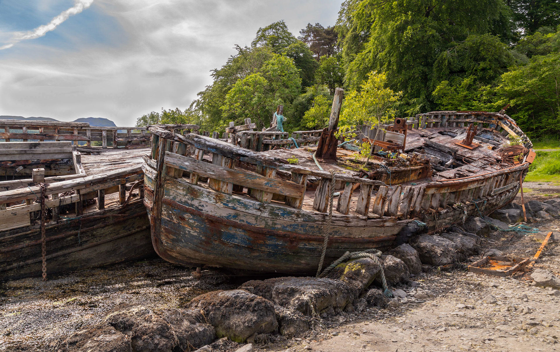 Beached fishing boat wrecks near Salen on the Isle of Mull