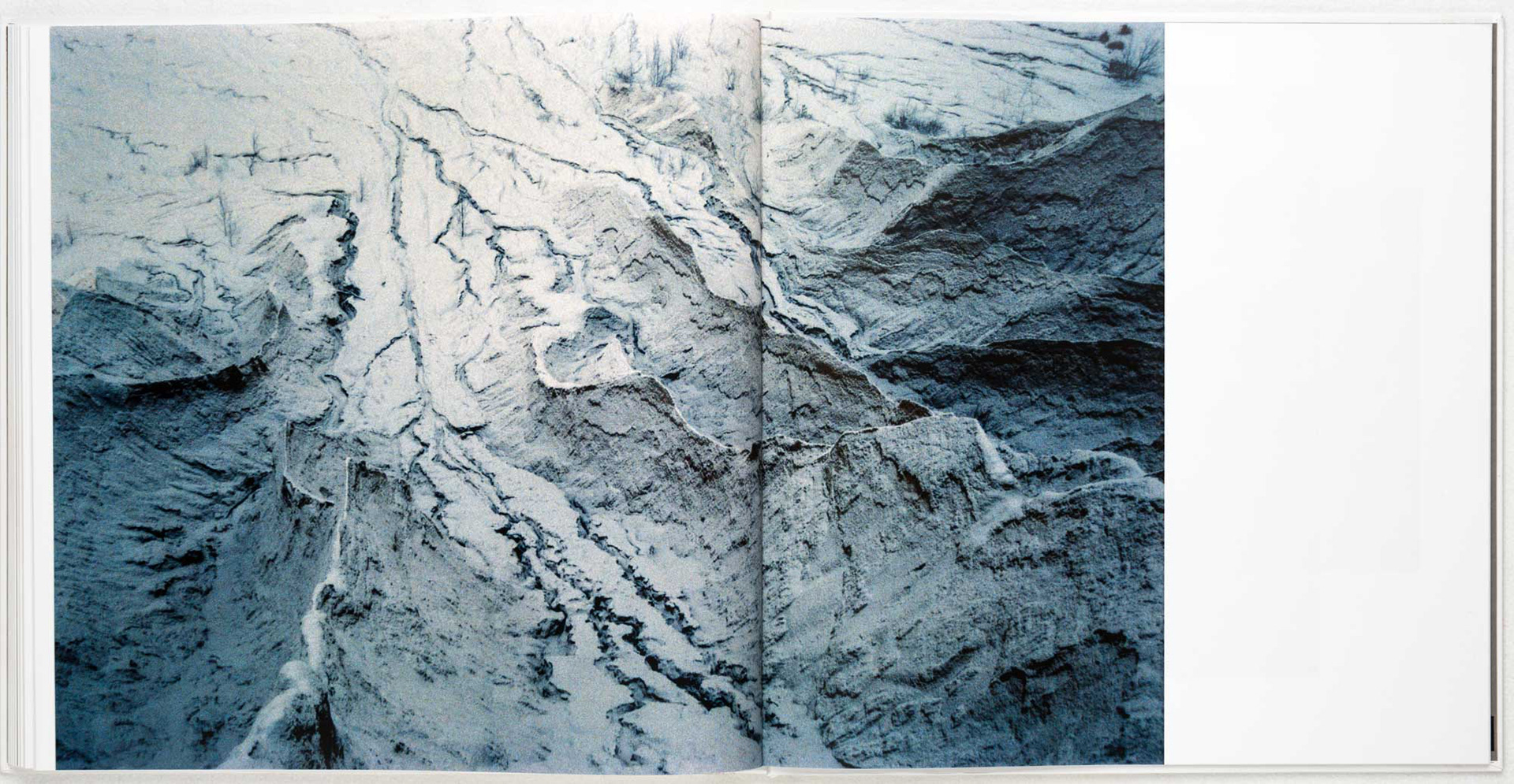 Mountain cracks documented by photographer Tobias Ahlbrecht.