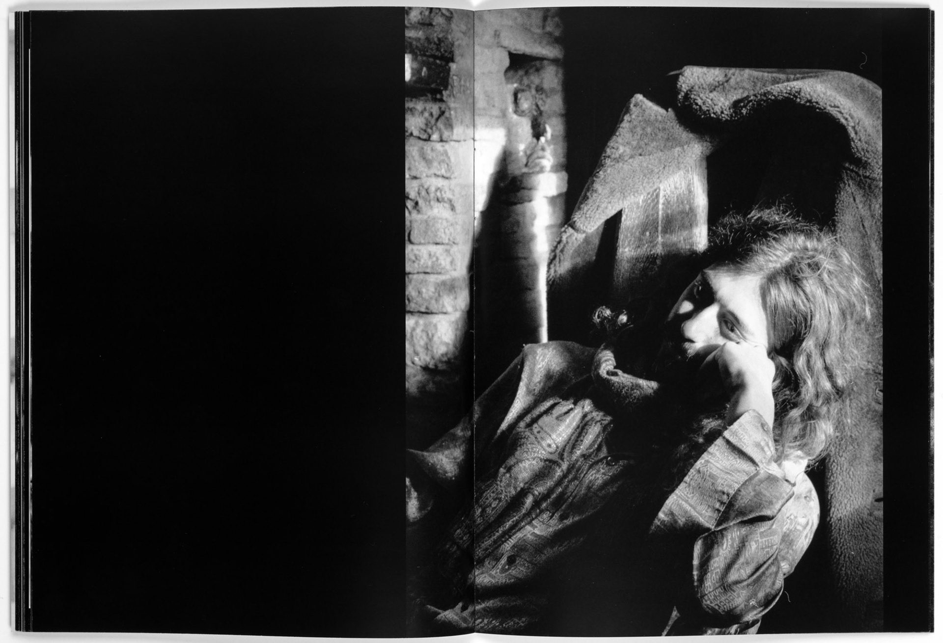 Ezra Evans thinking in a chair, photo by Tobias Ahlbrecht as part of the 'Book of Ezra'.