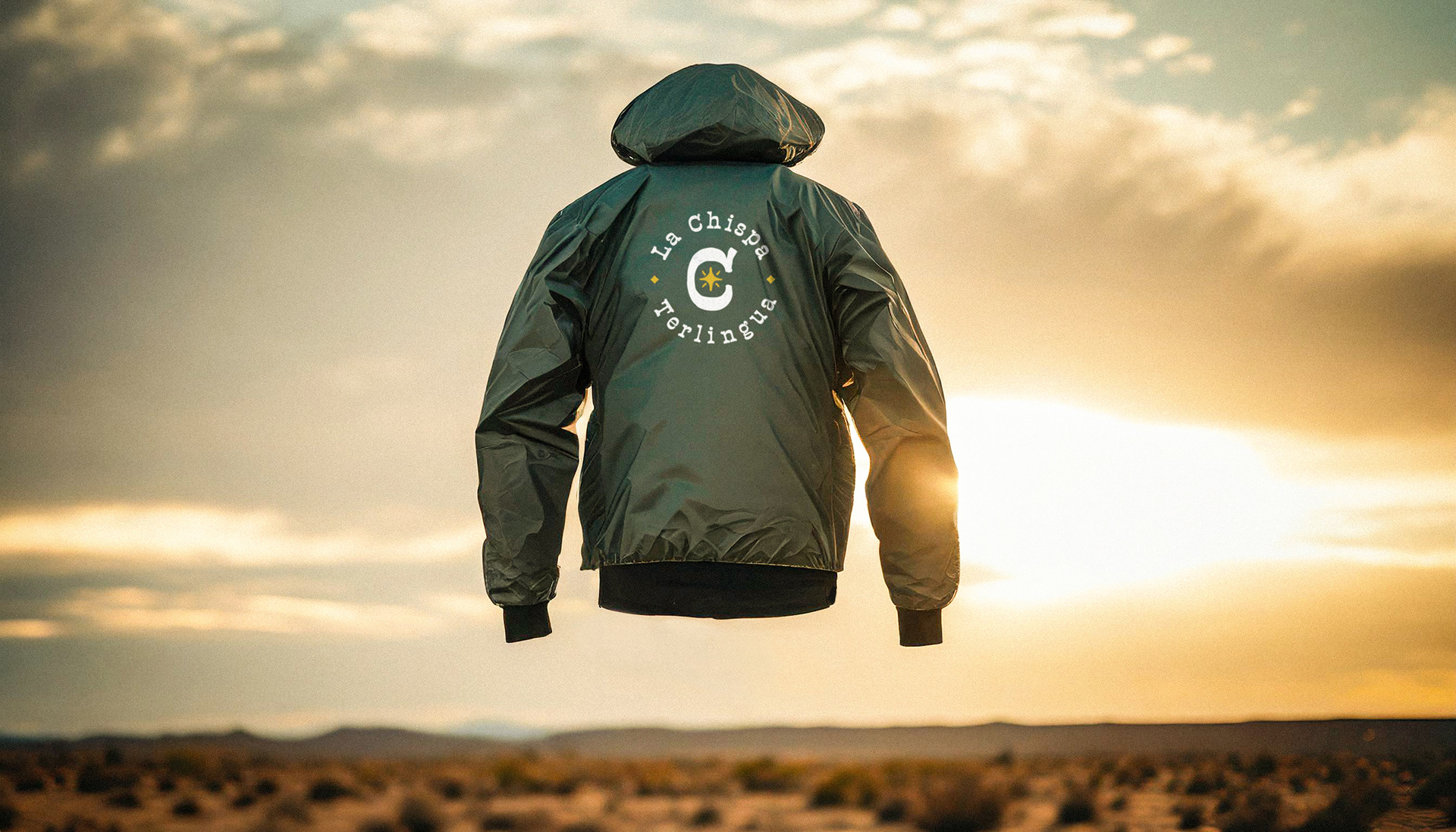Apparel raincoat design for La Chispa with logo and brand design by Chris Atkins Design