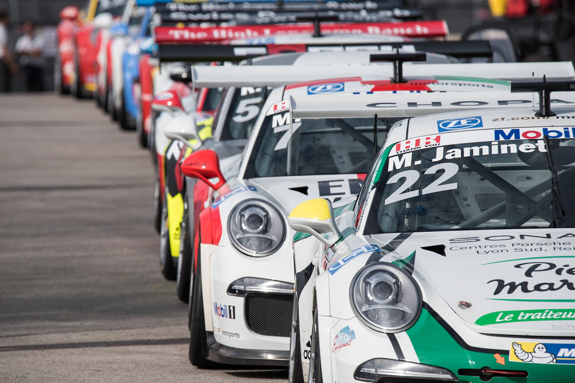 Competitors in the Porsche Mobil 1 Supercup line up in the paddock prior to the start of the race at Circuit of the Americas on Sunday, October 23rd, 2016.
