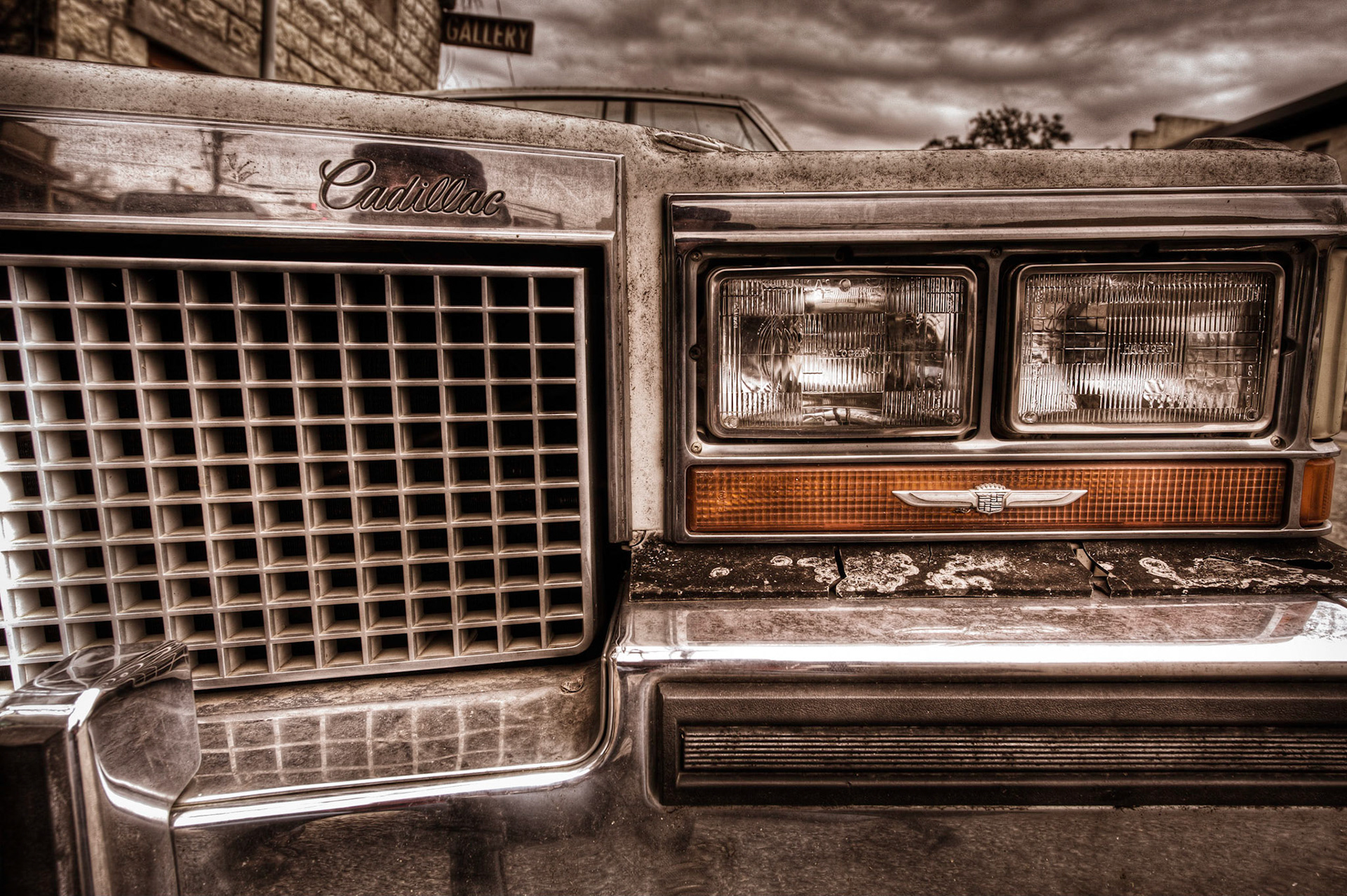 The front of a well-worn Cadillac seen in Johnson City, Texas.