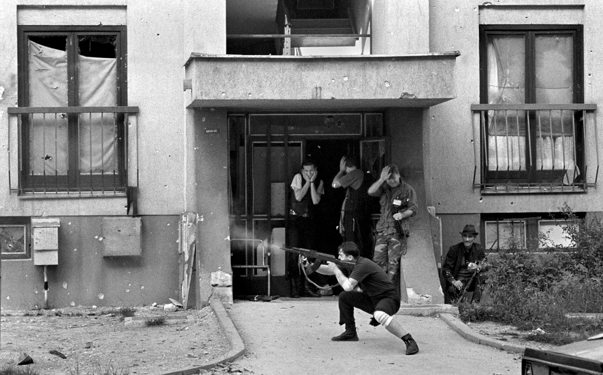 Bosnian government soldiers engage Bosnian Serbs in house to house fighting in Sarajevo on June 24, 1992. The Dobrinja neighbourhood was built to house athletes for the 1984 winter olympic games.