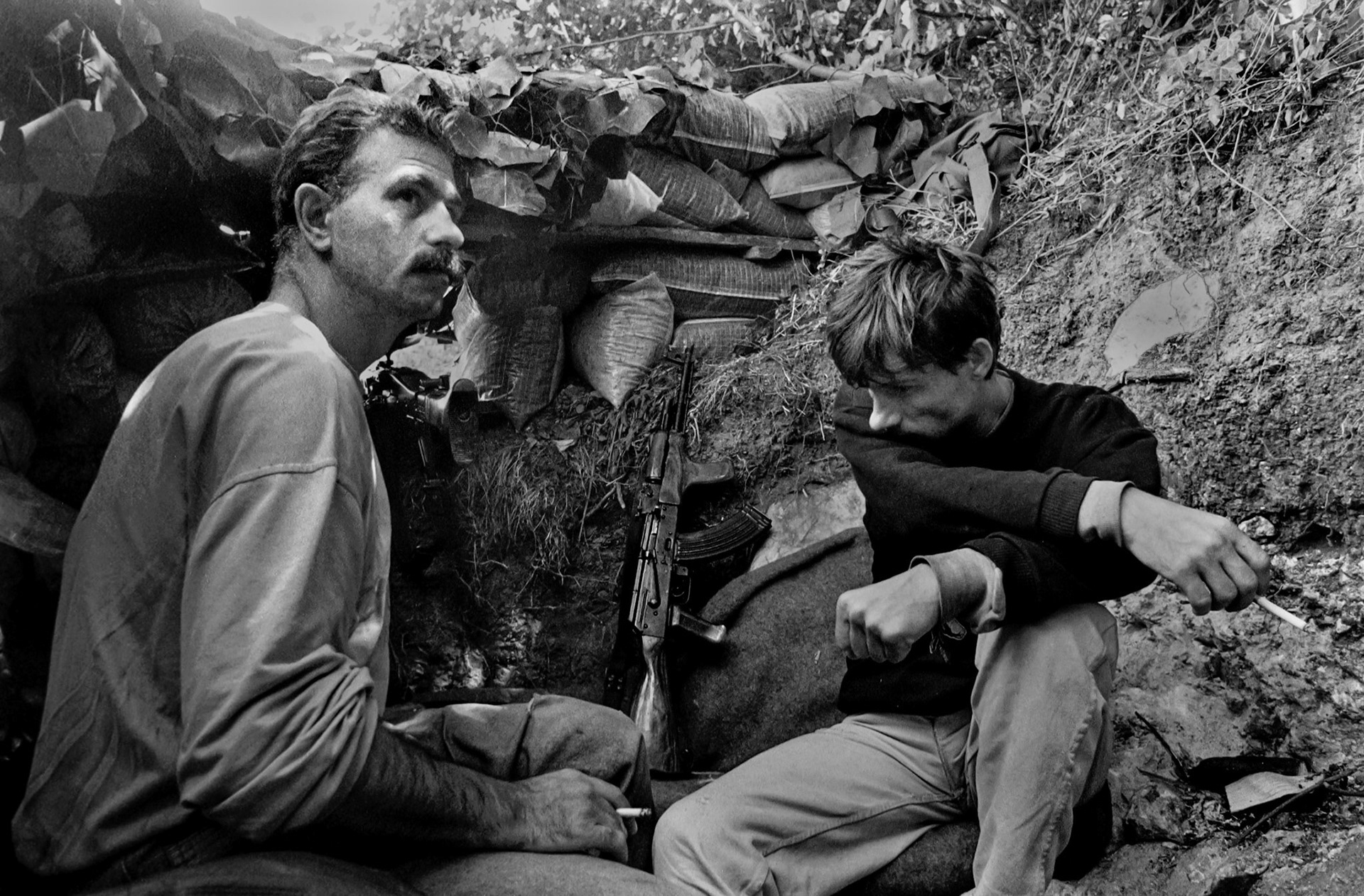 Bosnian government soldiers sit in a frontline position on the perimeter of the besieged capital Sarajevo on May 23, 1993.
