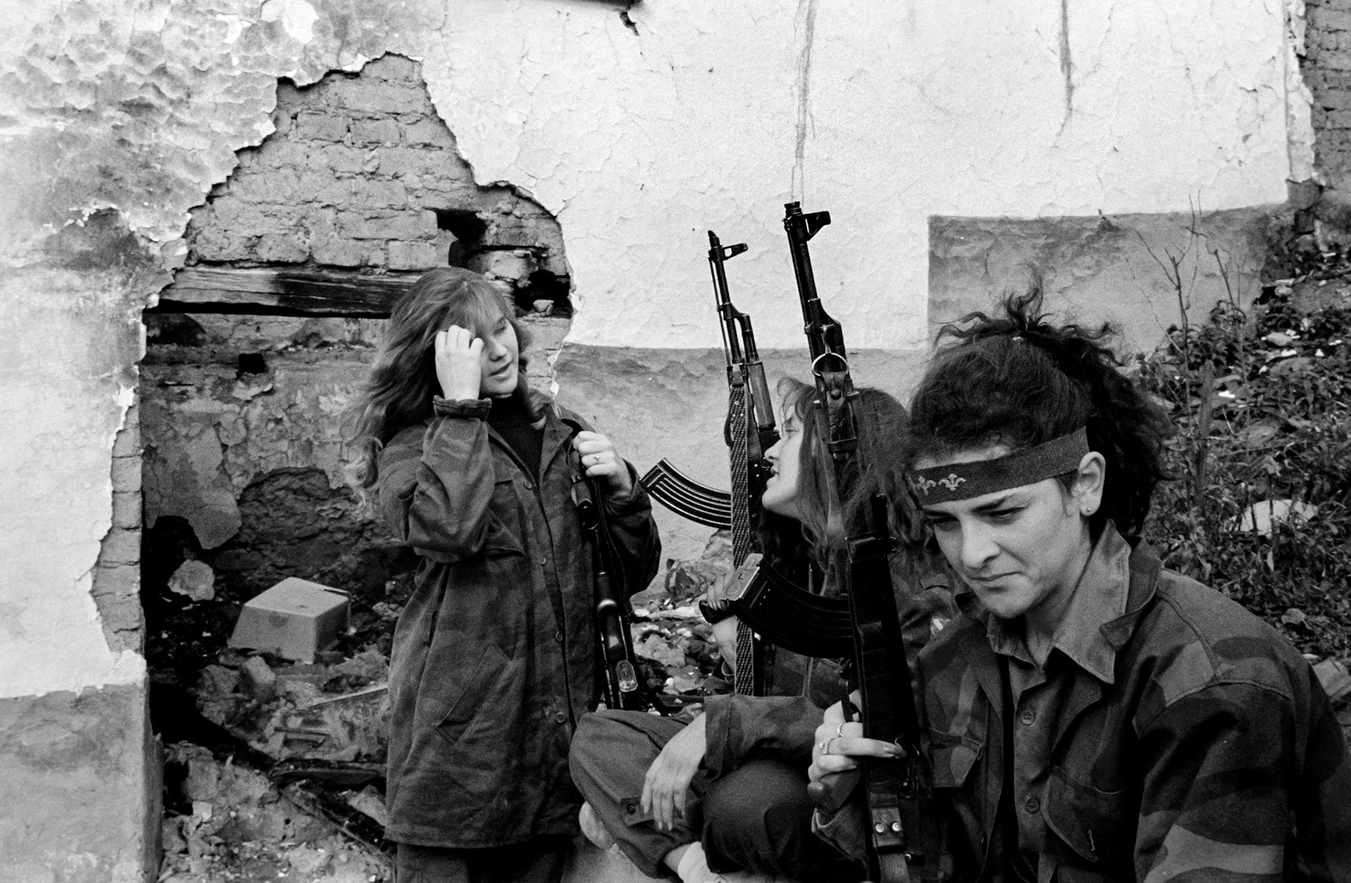 Members of the Bosnian government Army's female unit, the "Bluebird Brigade" at their bombed-out base near Sarajevo on October 10, 1992. Many of the women in the unit are widows of soldiers who have died in the war.