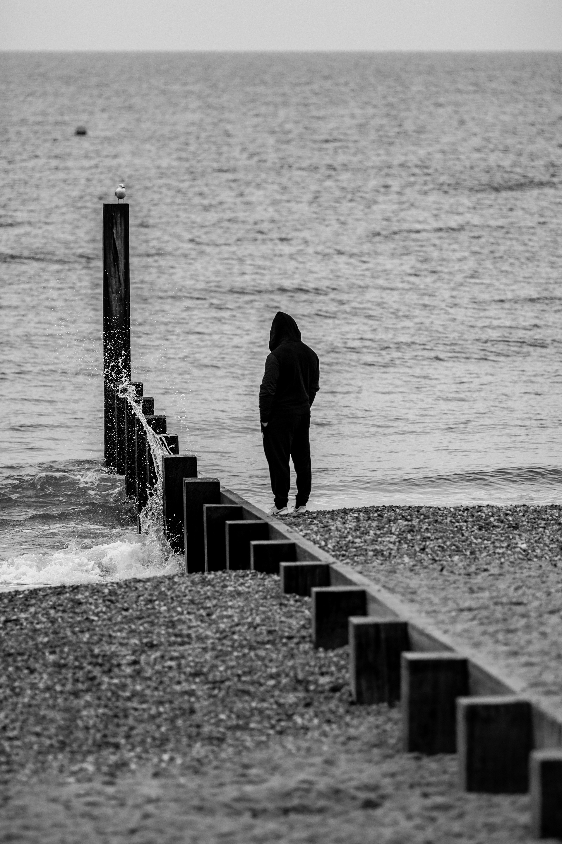 Solitary man on the beach at Boscombe