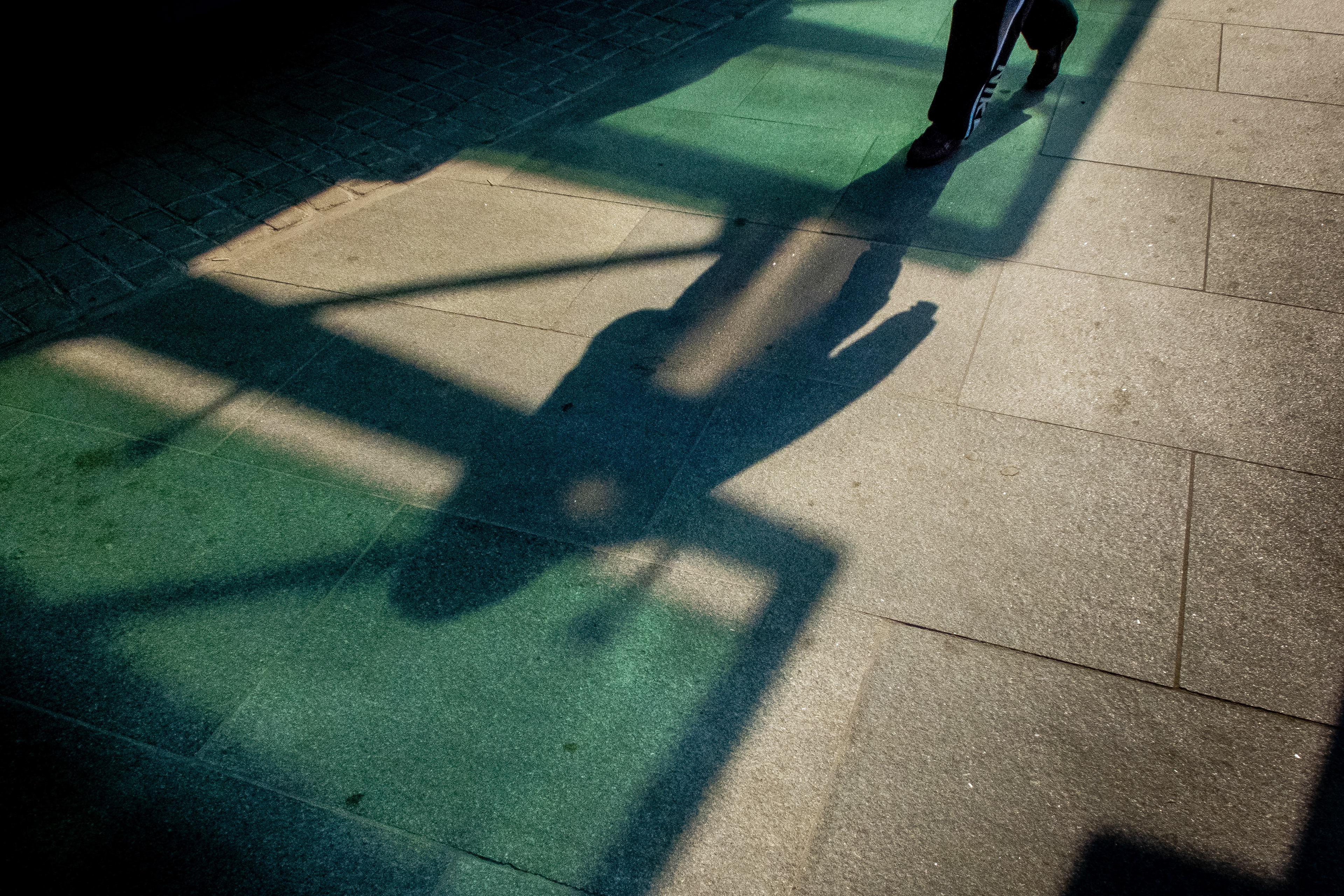 Pedestrian walks past University College Hospital, London