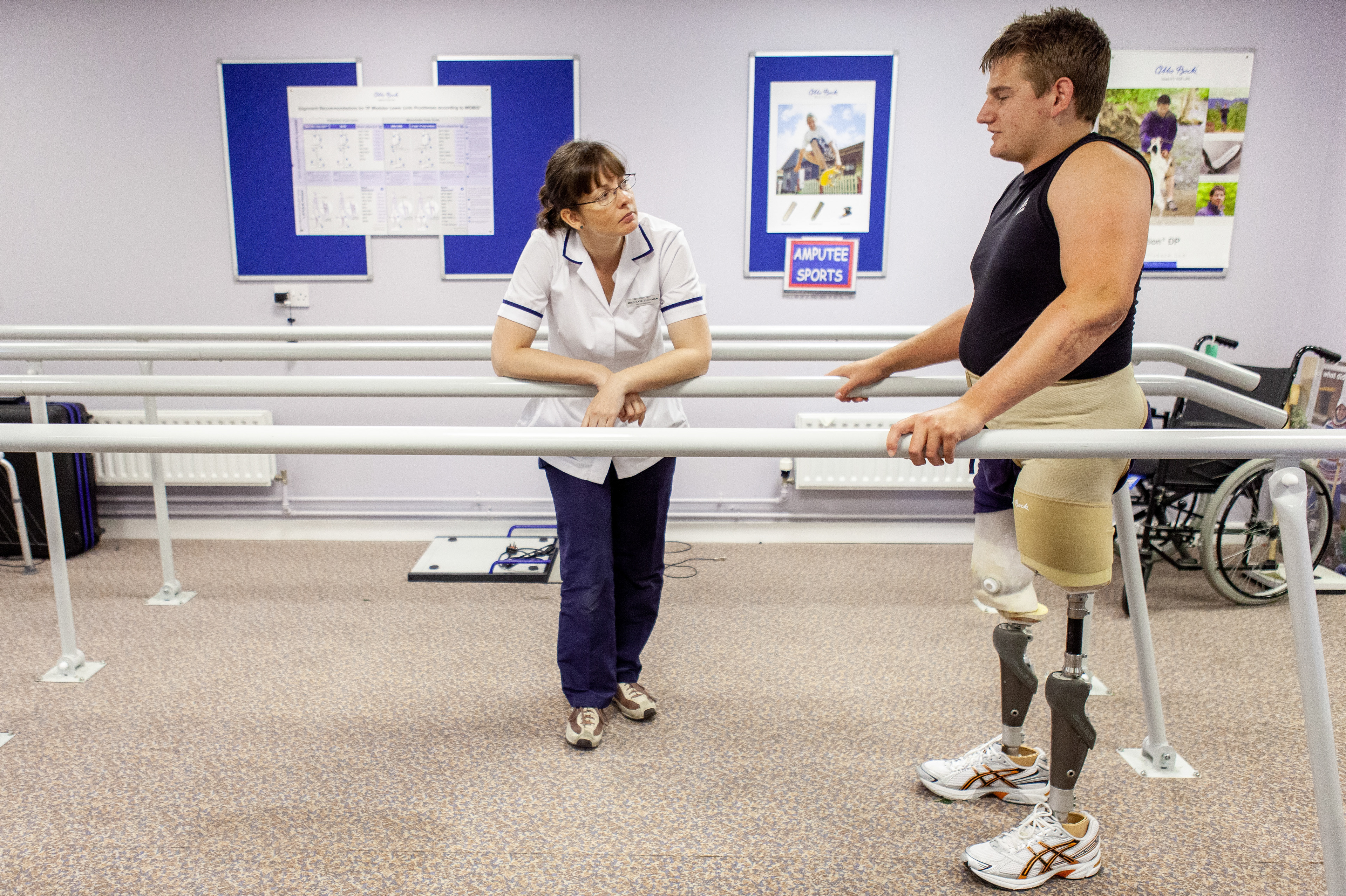 Marine Joe Townsend working with a physiotherapist at Headley Court, Surrey