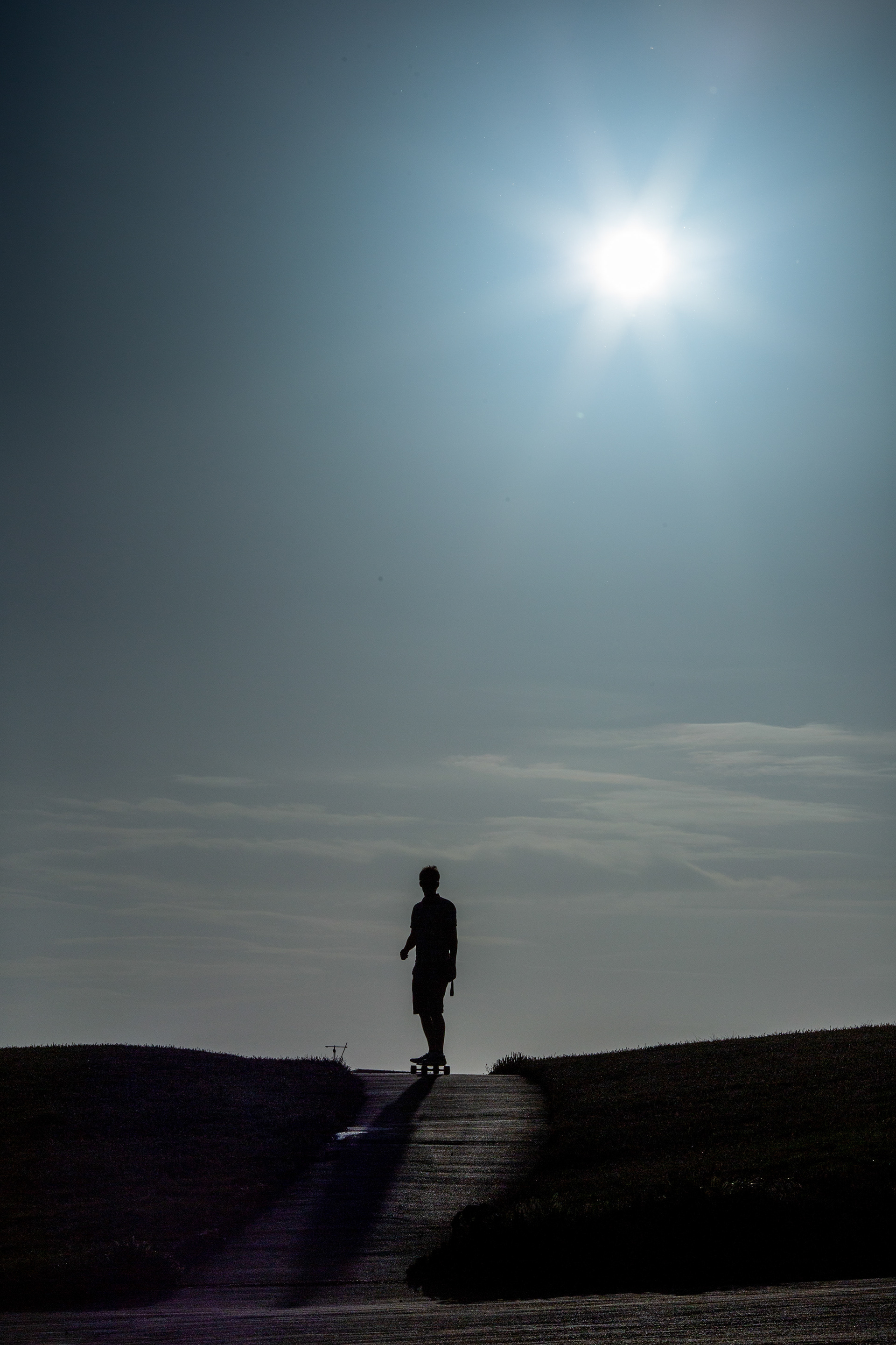 Skateboarder at dusk at Fisherman's Walk in Bournemouth